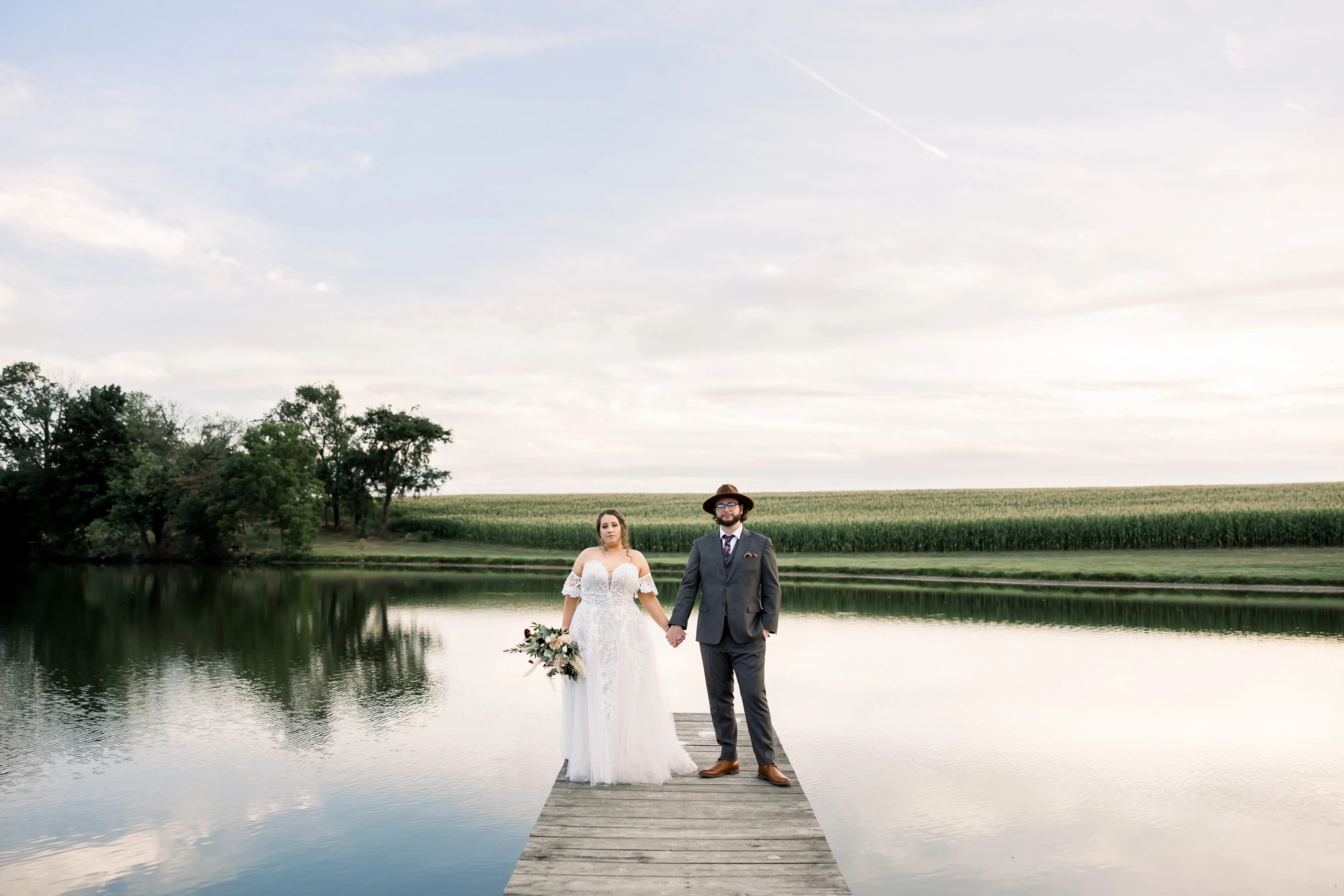 Plus Size Bride In Lace A-Line Wedding Dress Called Nora By Maggie Sottero With Groom