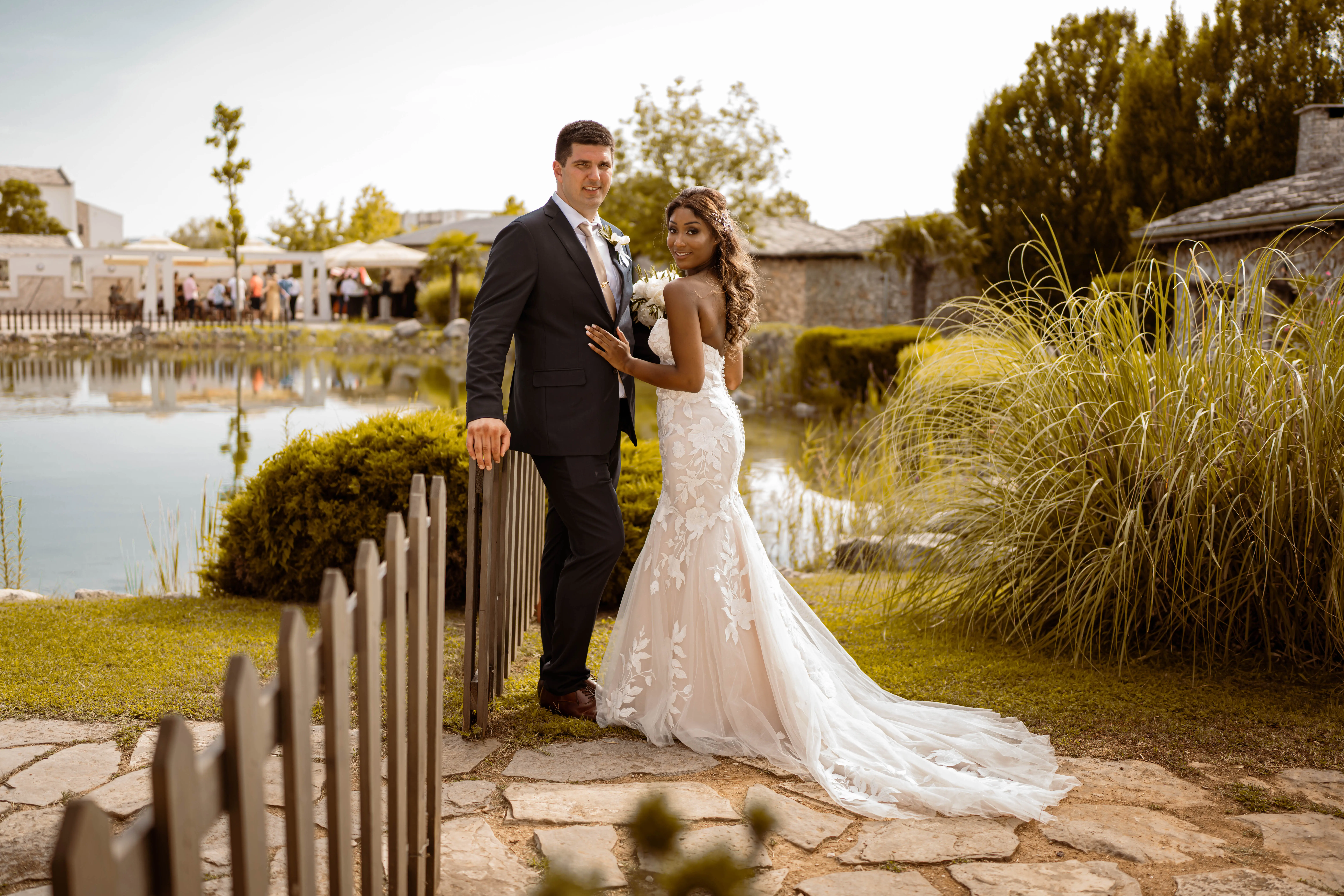 Groom With Bride Wearing Mermaid Wedding Dress With Oversized Lace Hattie By Rebecca Ingram