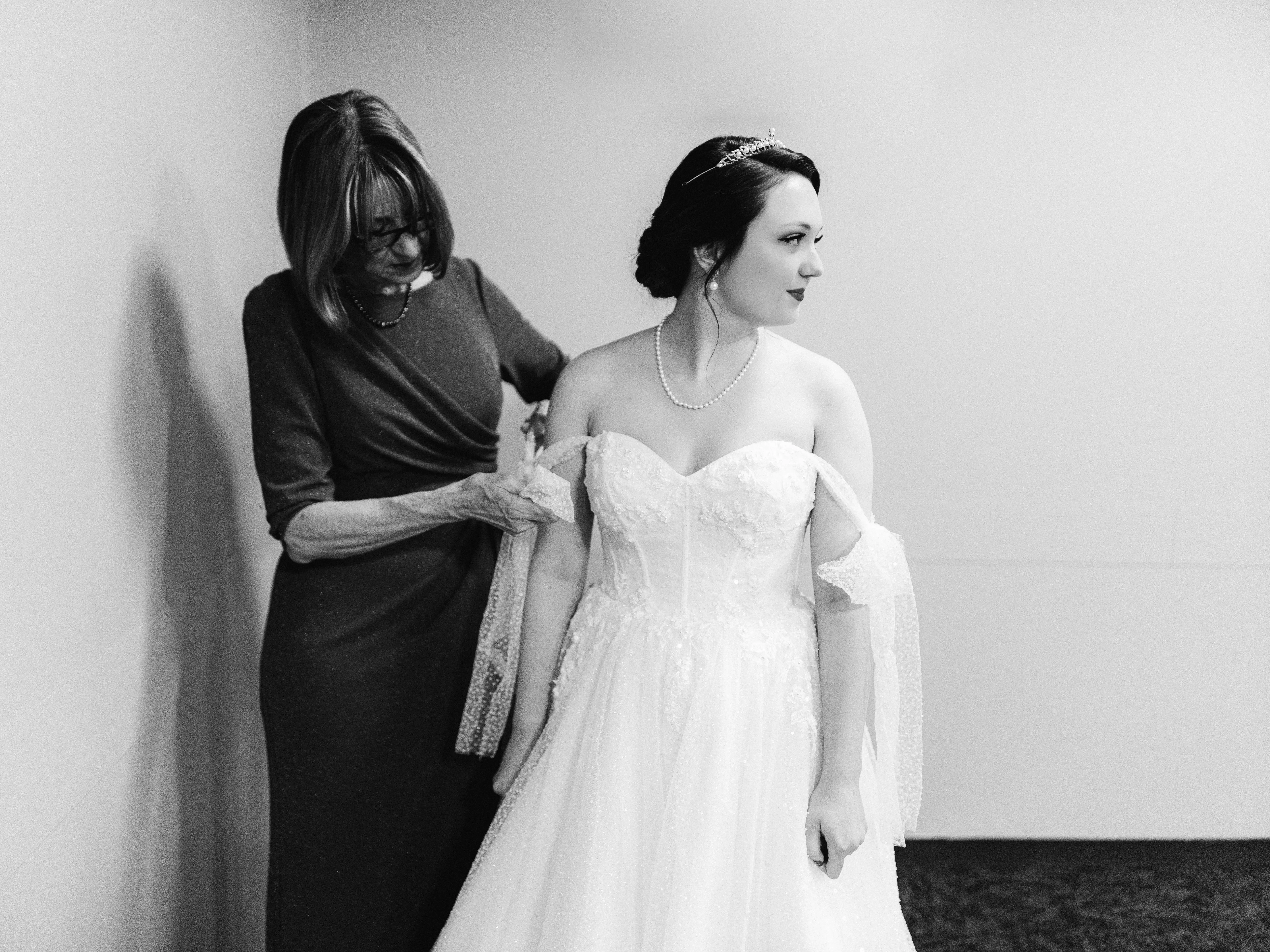Bride Wearing Princess Ballgown Wedding Dress called Shasta by Sottero and Midgley Getting Ready