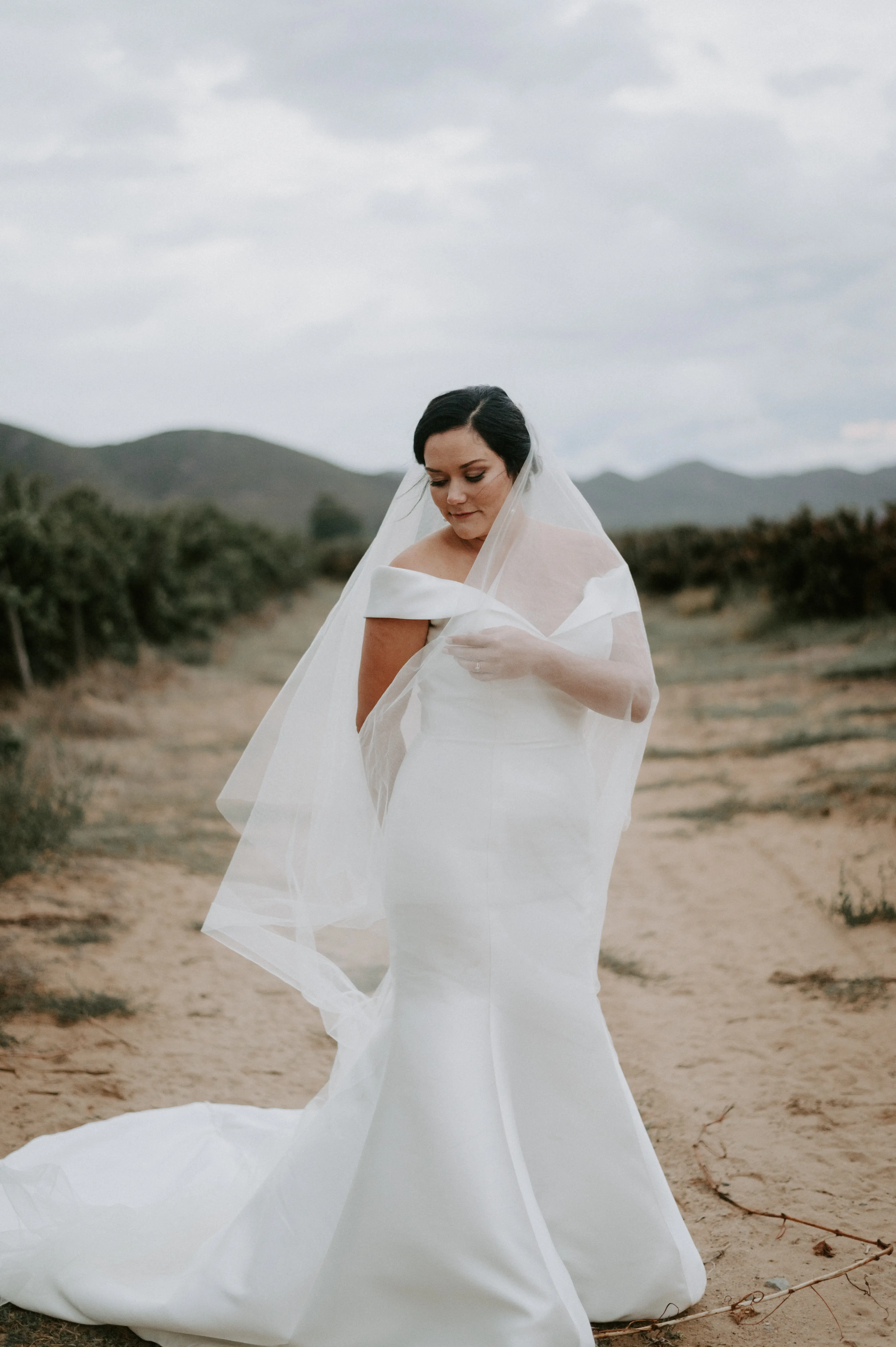 Bride Wearing Vintage Off The Shoulder Fit-And-Flare Wedding Dress Josie By Rebecca Ingram