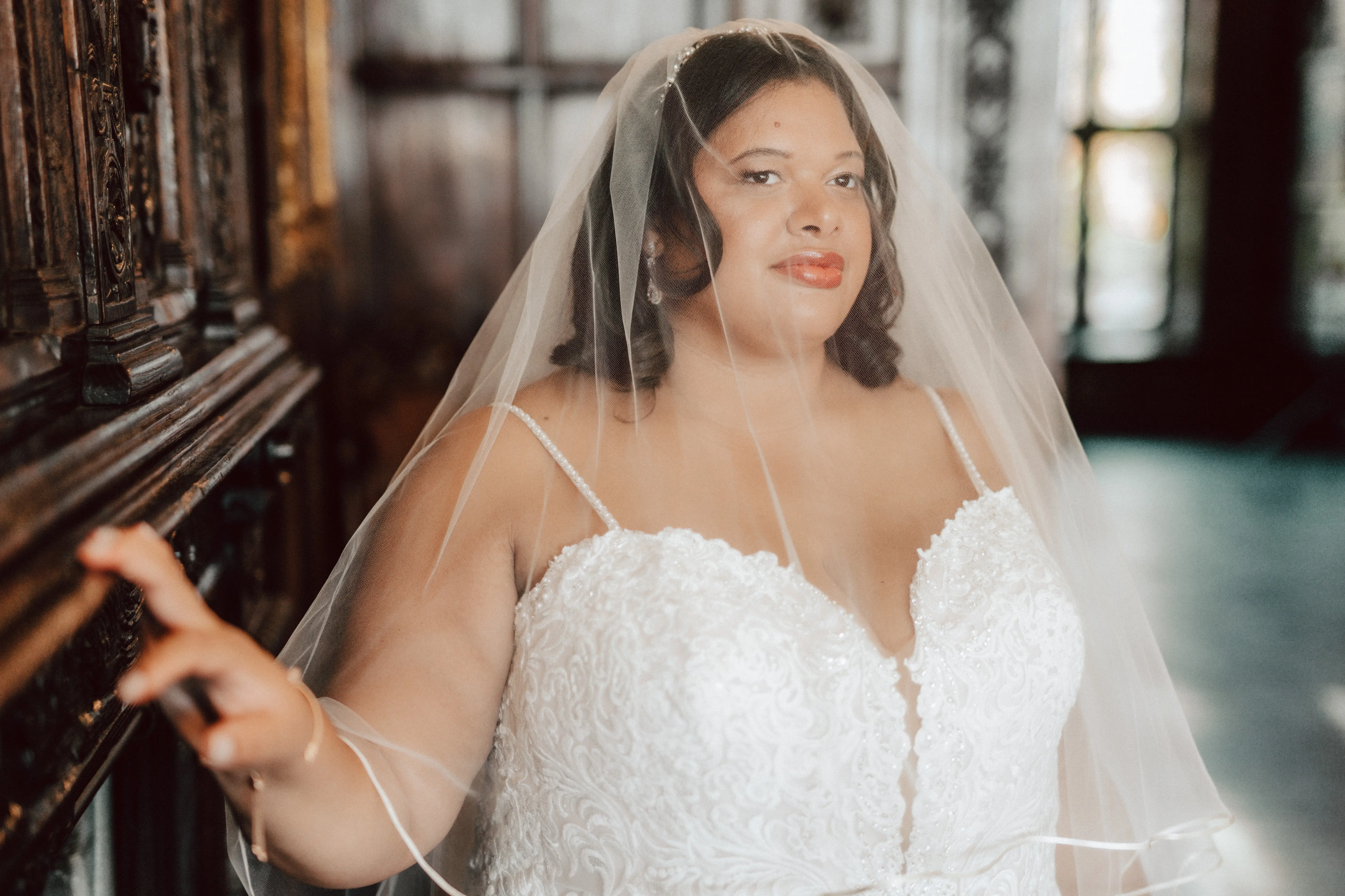 Bride Wearing Veil and Wedding Dress Called Alistaire Lynette by Maggie Sottero