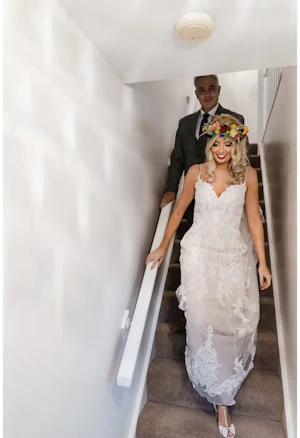 Father of the Bride and Bride Wearing Elegant Fit-and-Flare Bridal Dress by Maggie Sottero
