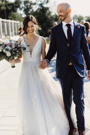 Groom With Bride Wearing Vintage Style A-Line Joanne By Rebecca Ingram