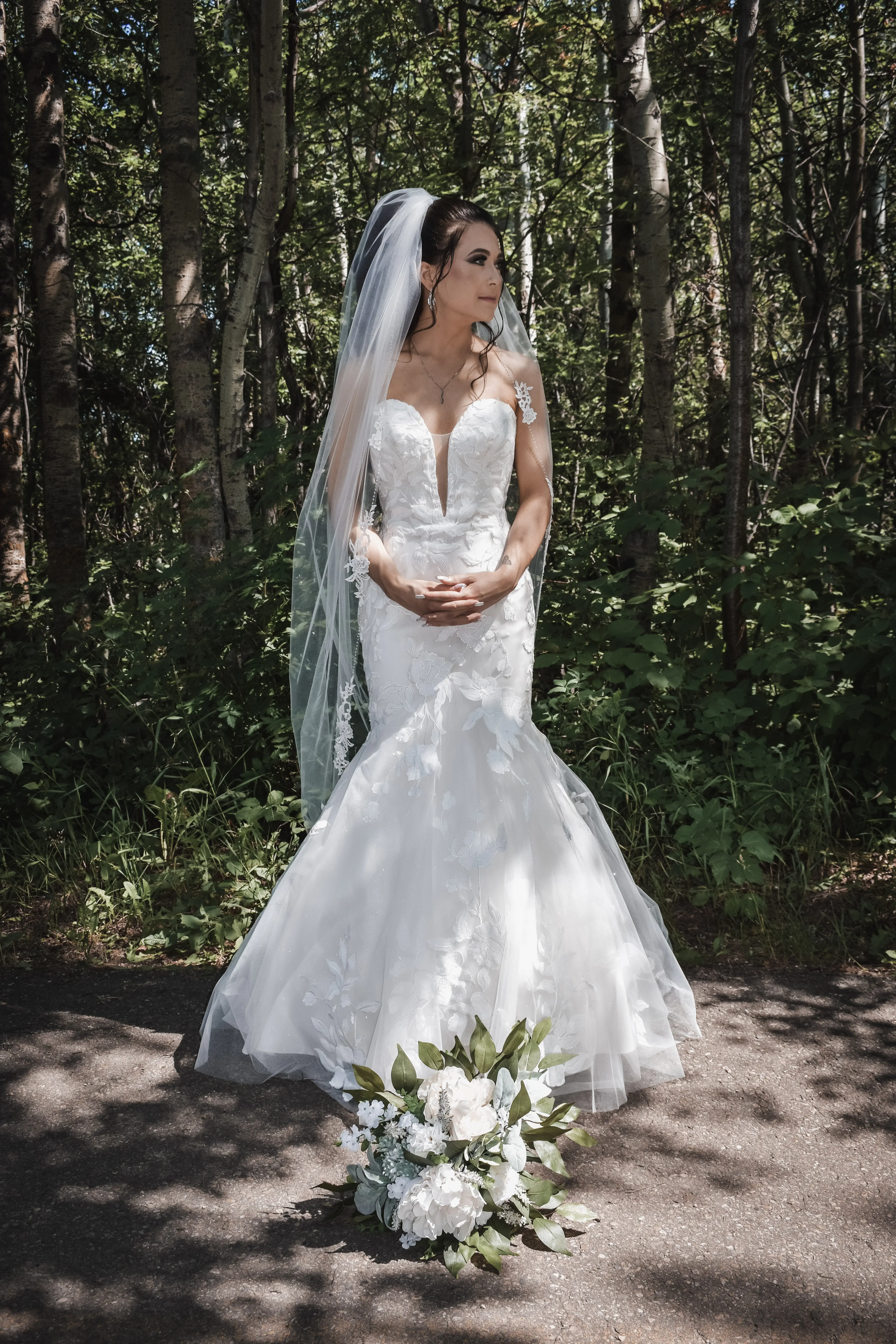 Bride Wearing Lace Mermaid Wedding Dress Called Hattie By Rebecca Ingram In The Forest