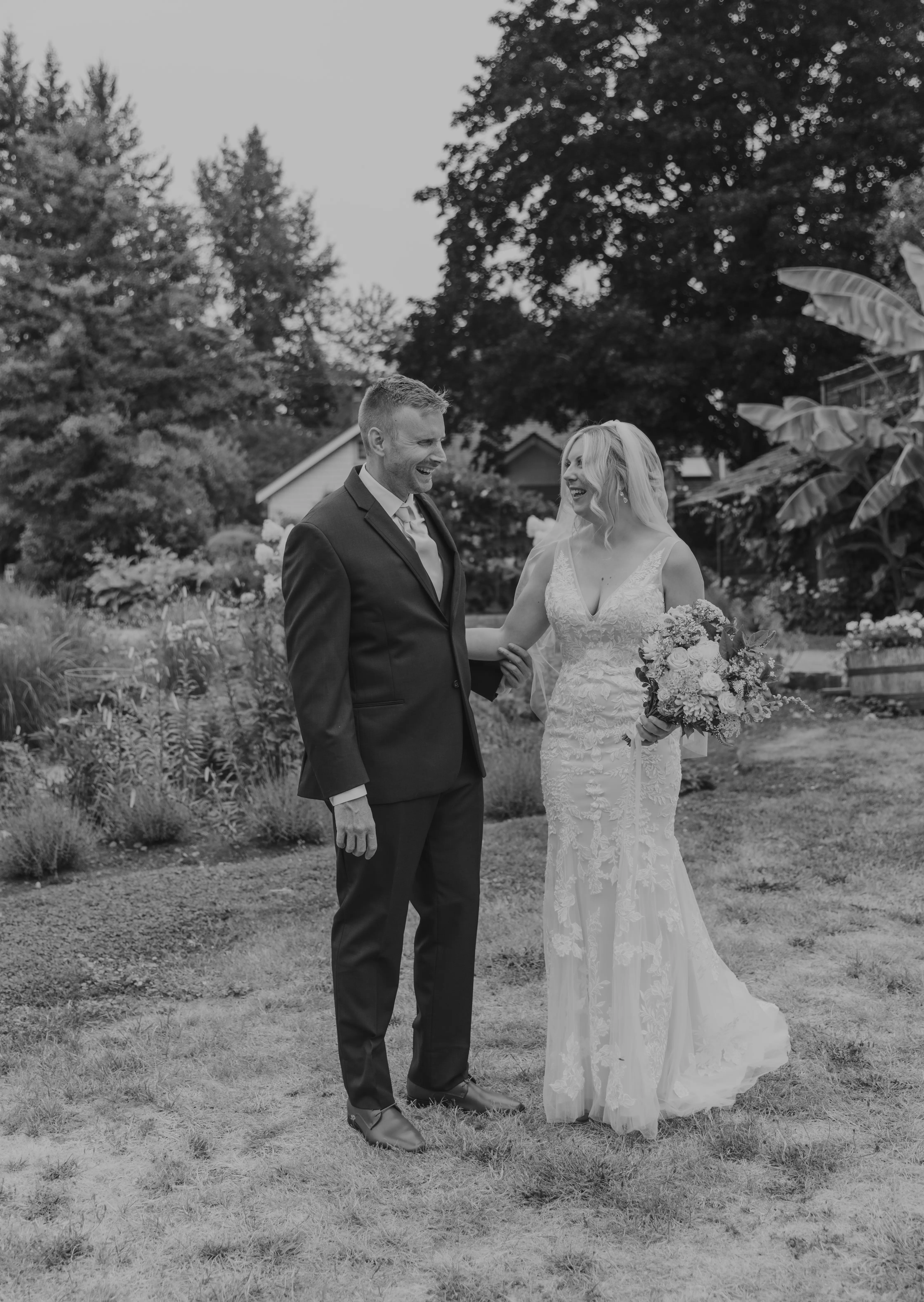 Bride wearing Greenley wedding dress by Maggie Sottero with her husband
