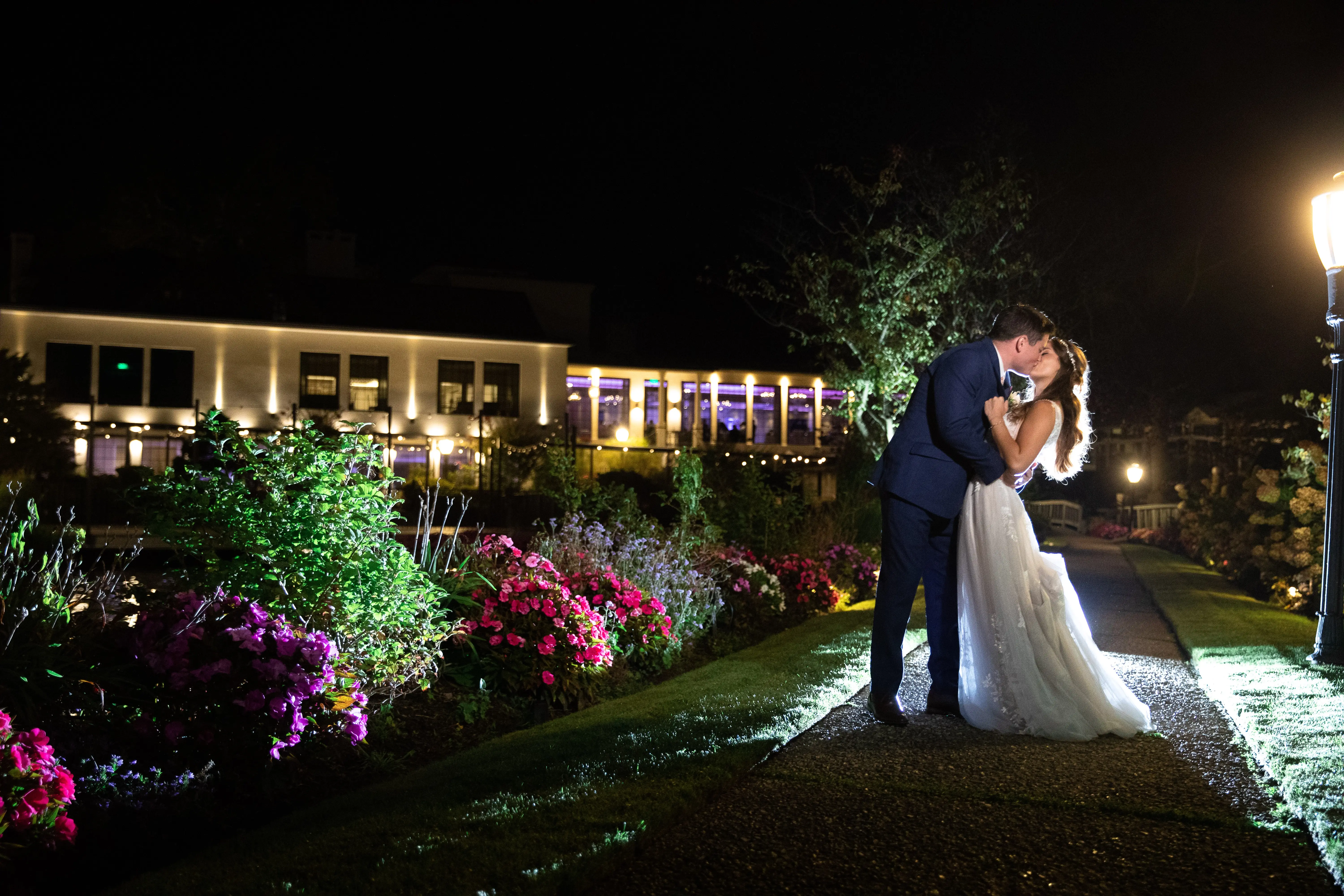 wearing Lace A-line Wedding Dress called Raelynn by Rebecca Ingram and groom
