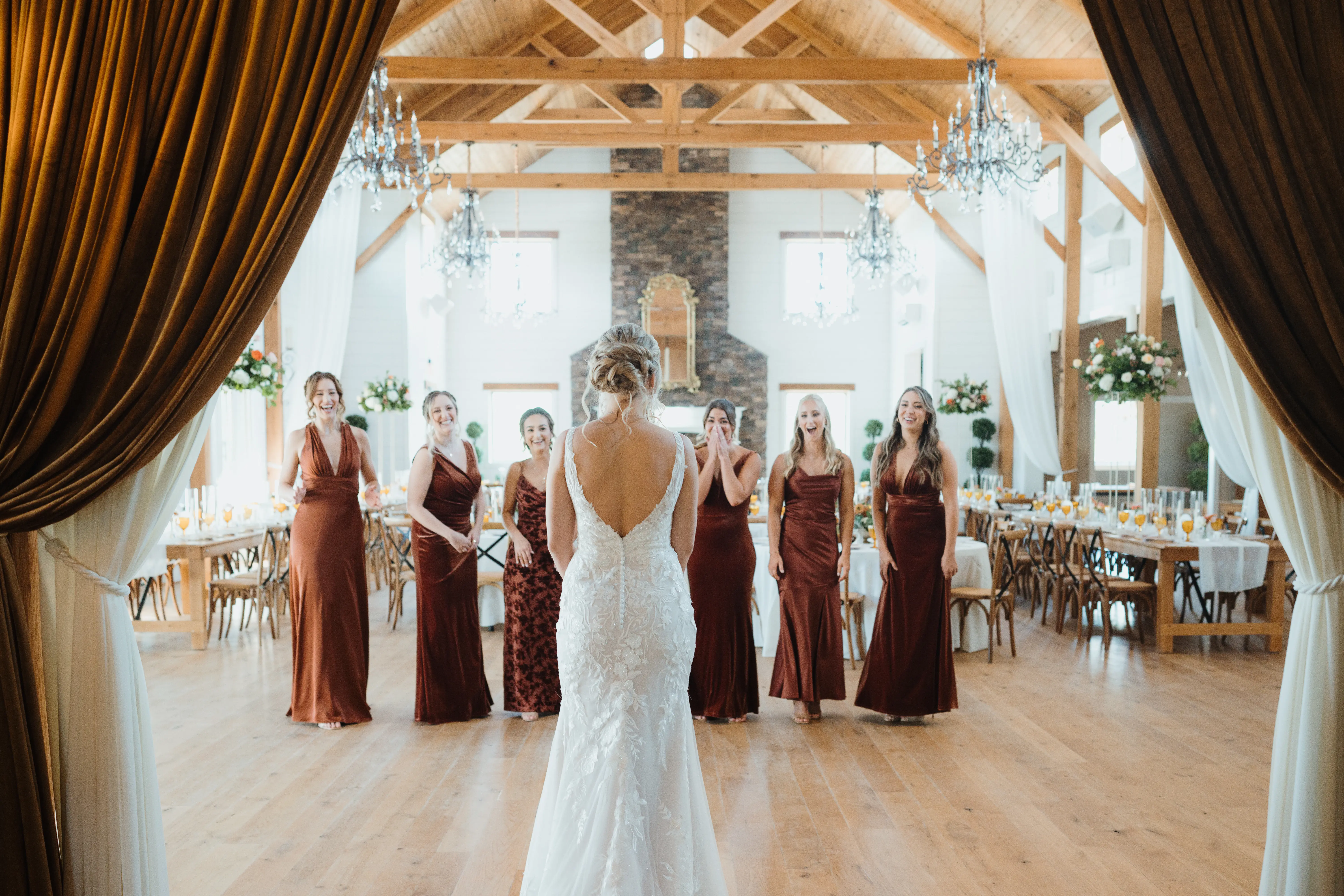 Bride wearing Albany wedding dress by Maggie Sottero with her bridesmaids