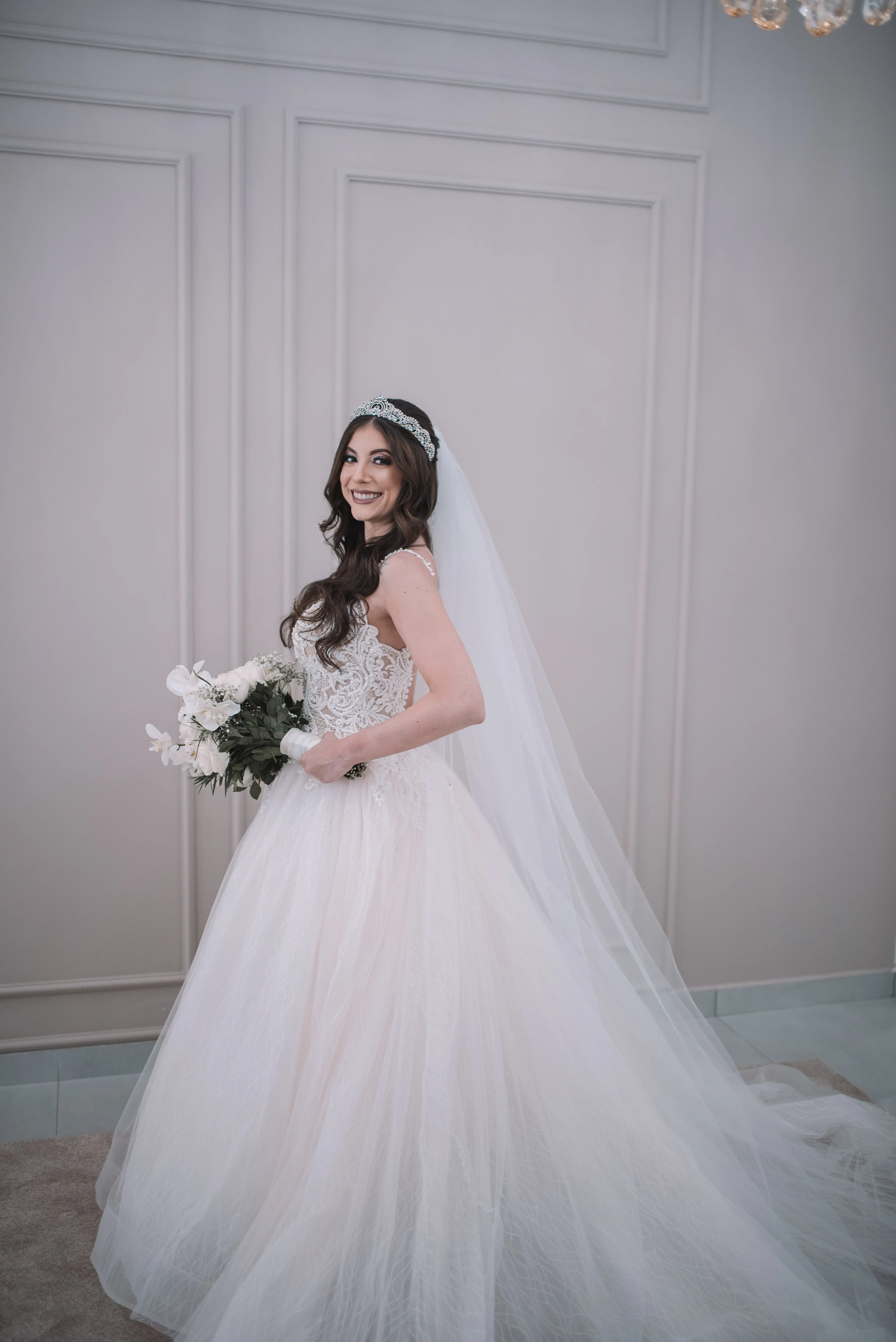 Bride in Flirty A-Line Wedding Gown with Beaded Lace Motifs over Textured Tulle and Precious Organza with Sheer Beaded Bodice Called Savannah by Maggie Sottero