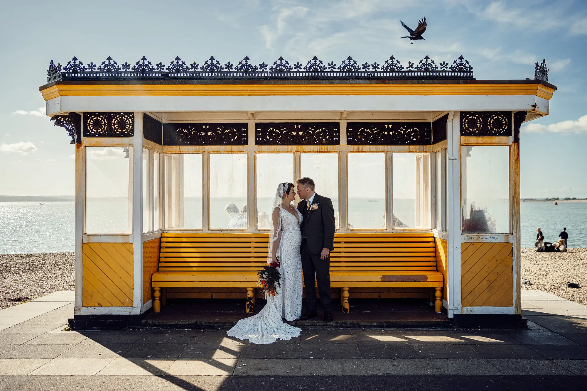 Bride Wearing Boho Lace Wedding Dress Called Burke By Maggie Sottero With Groom At Vintage Bus Stop