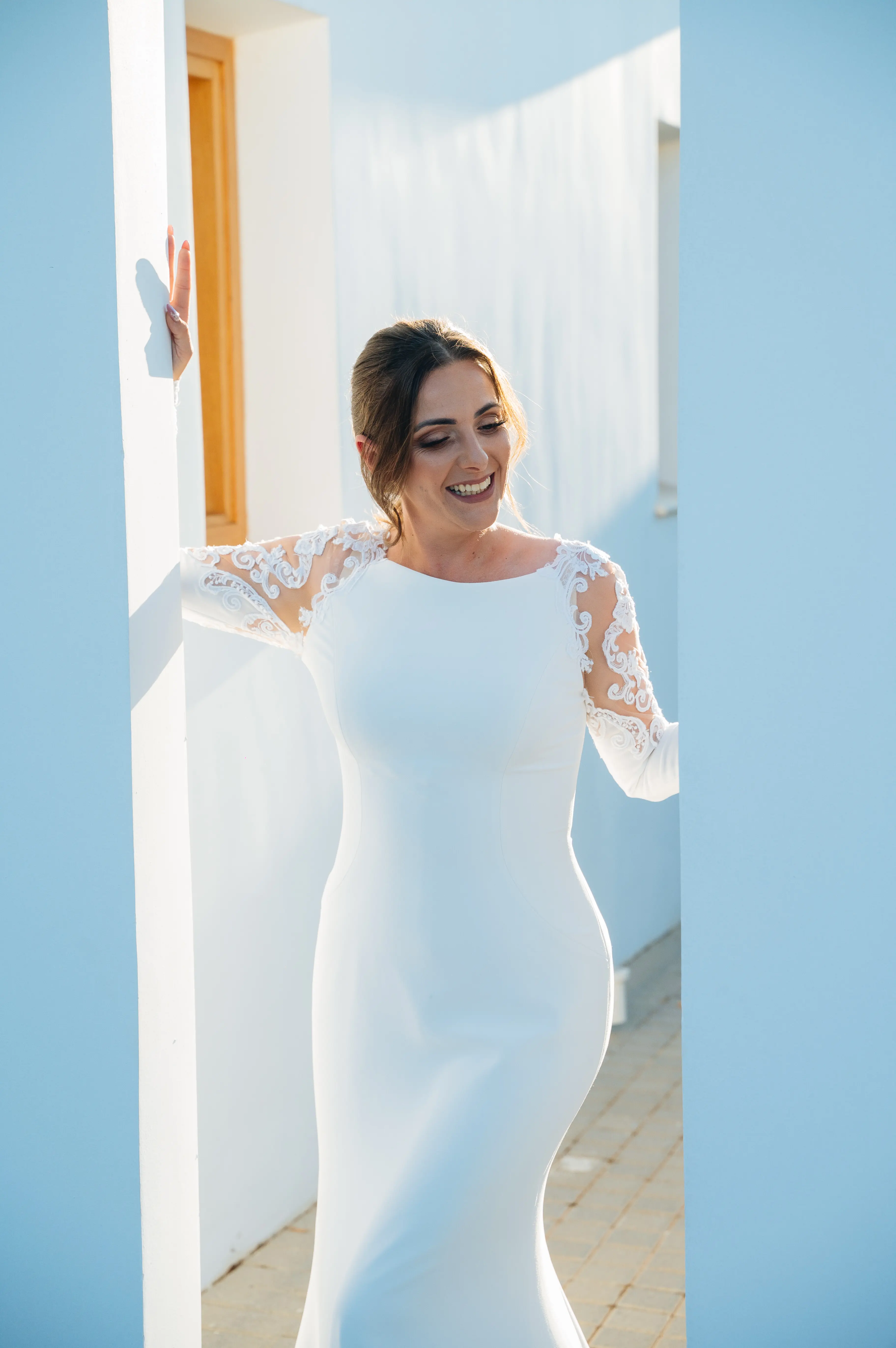 Real Bride in Minimalist Crepe Long Sleeve Lace Sheath Wedding Dress Called Bethany by Rebecca Ingram