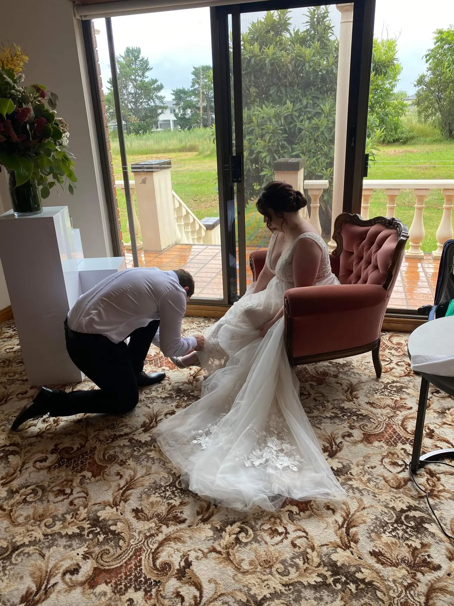 Bride Getting Ready in A-Line Wedding Dress Raelynn by Rebecca Ingram