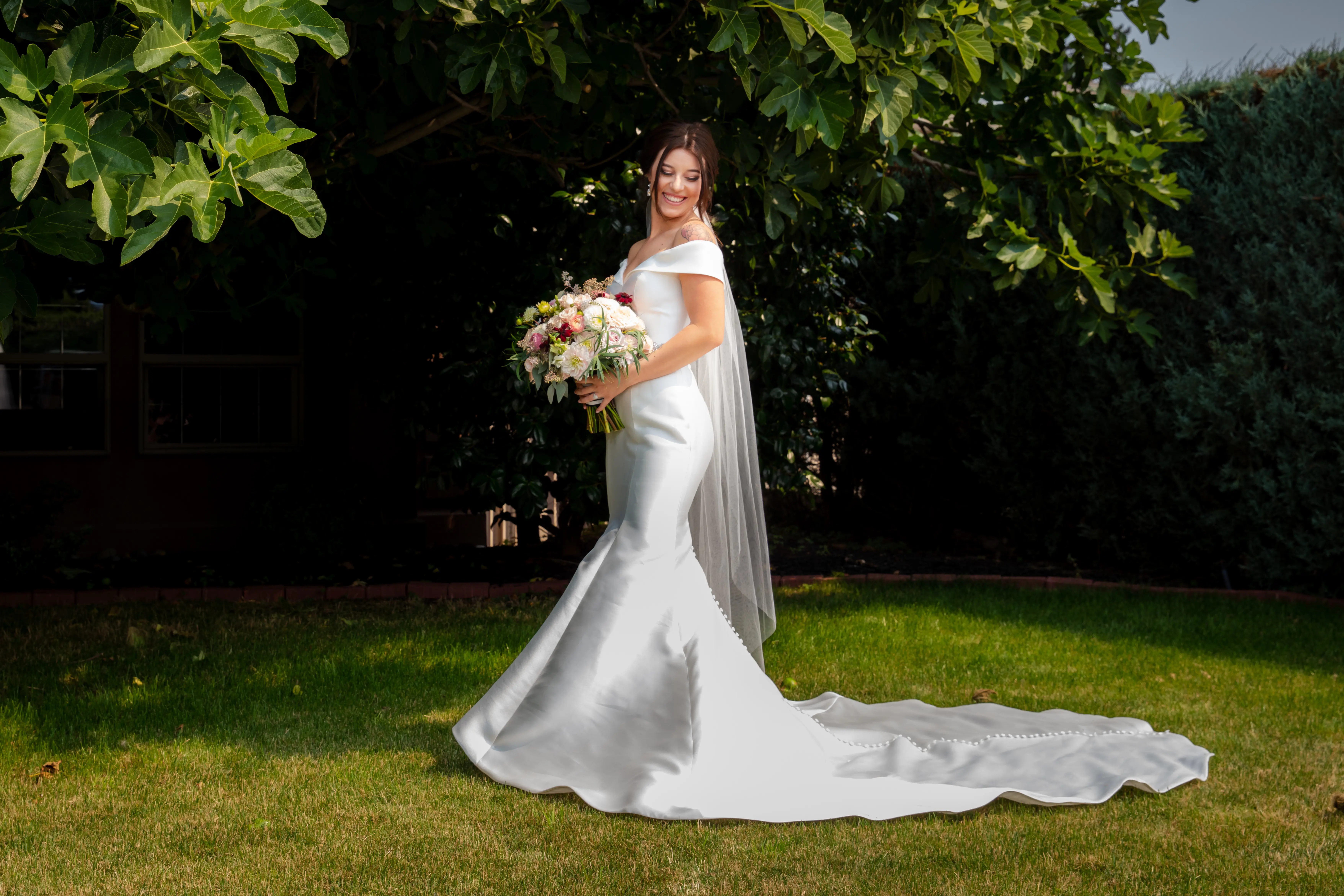 Bride Wearing Simple Classic Wedding Gown Called Josie By Rebecca Ingram