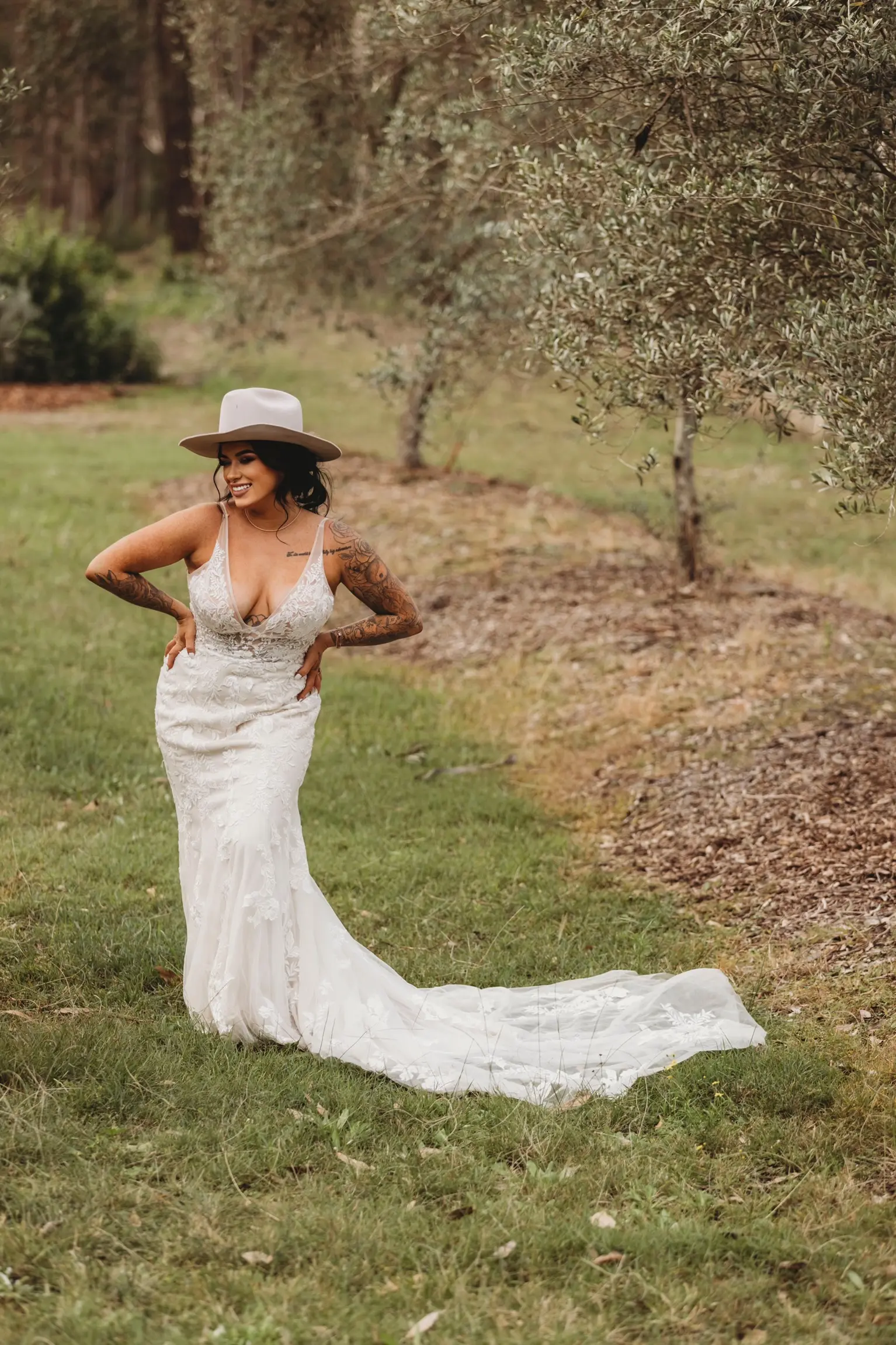 Bride In Cowboy Hat And Gown Called Greenley Lane By Maggie Sottero