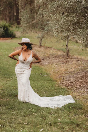 Bride In Cowboy Hat And Gown Called Greenley Lane By Maggie Sottero