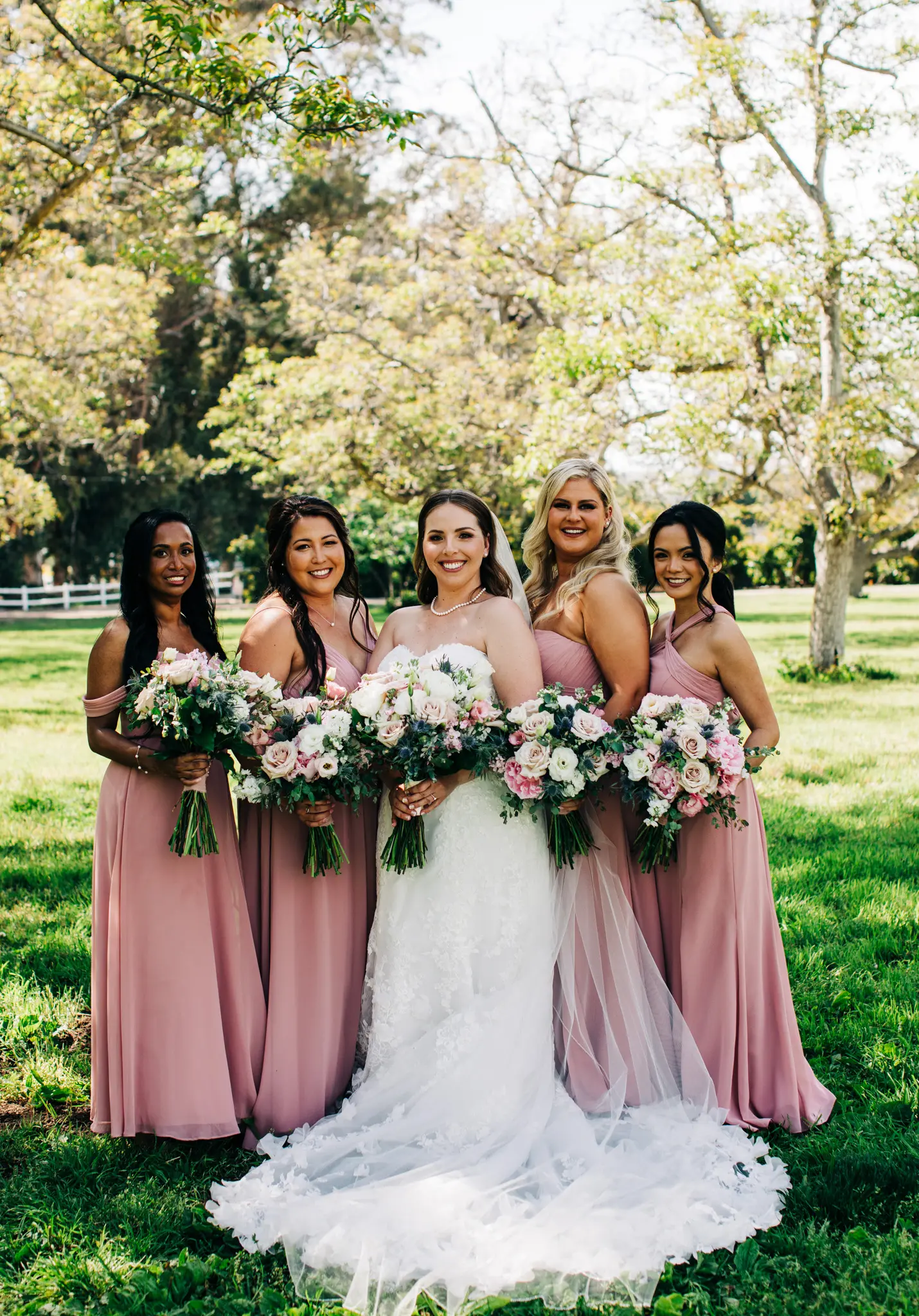 Bride In 3D Lace Fit-and-Flare Ryker Sottero Midgley With Bridesmaids in Pink