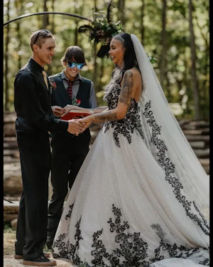Groom With Bride Wearing Ball Gown With Black Lace Tristyn By Maggie Sottero