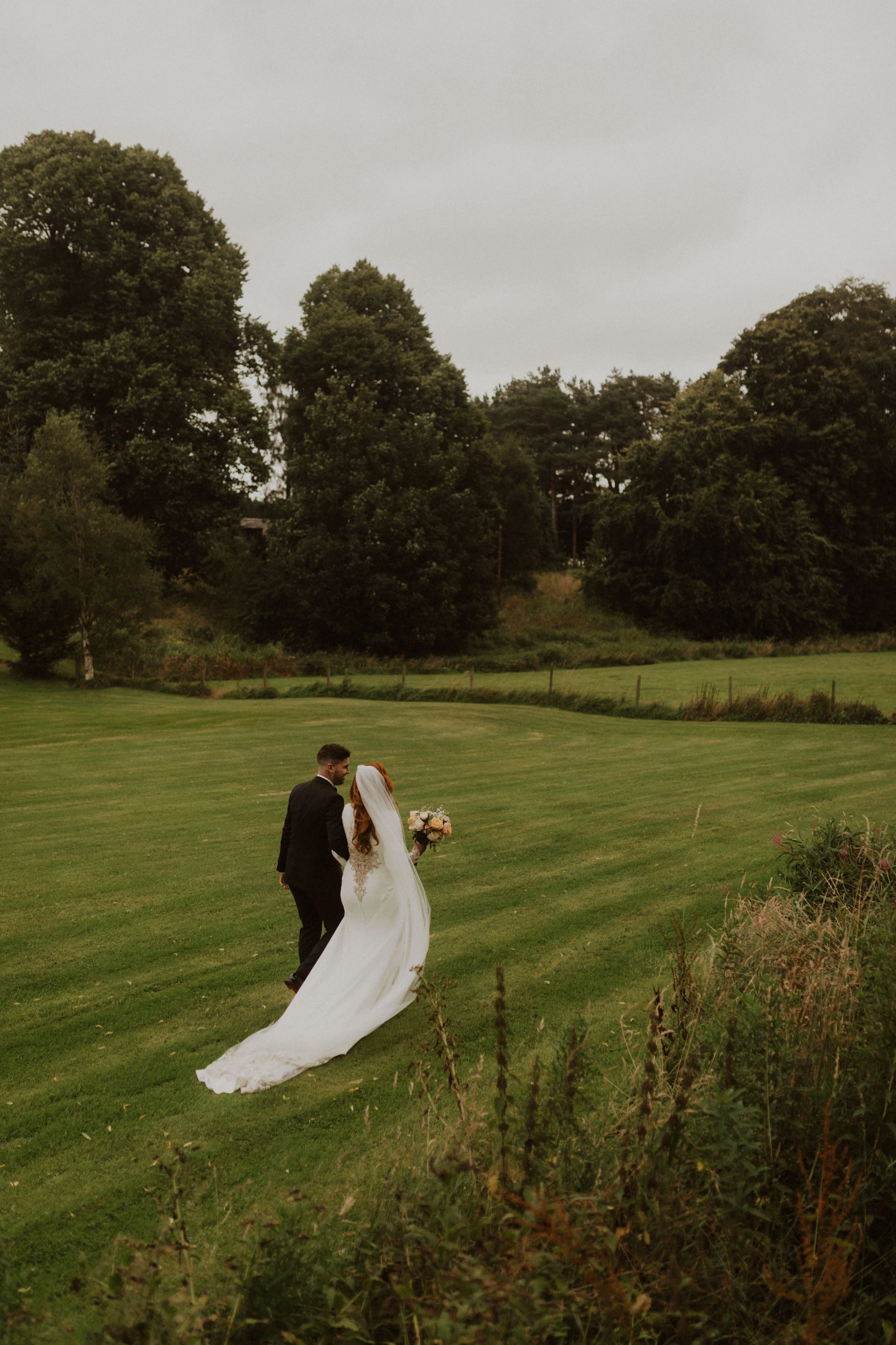 Groom With Bride Wearing Crepe Fit And Flare Wedding Dress Aston By Sottero And Midgley