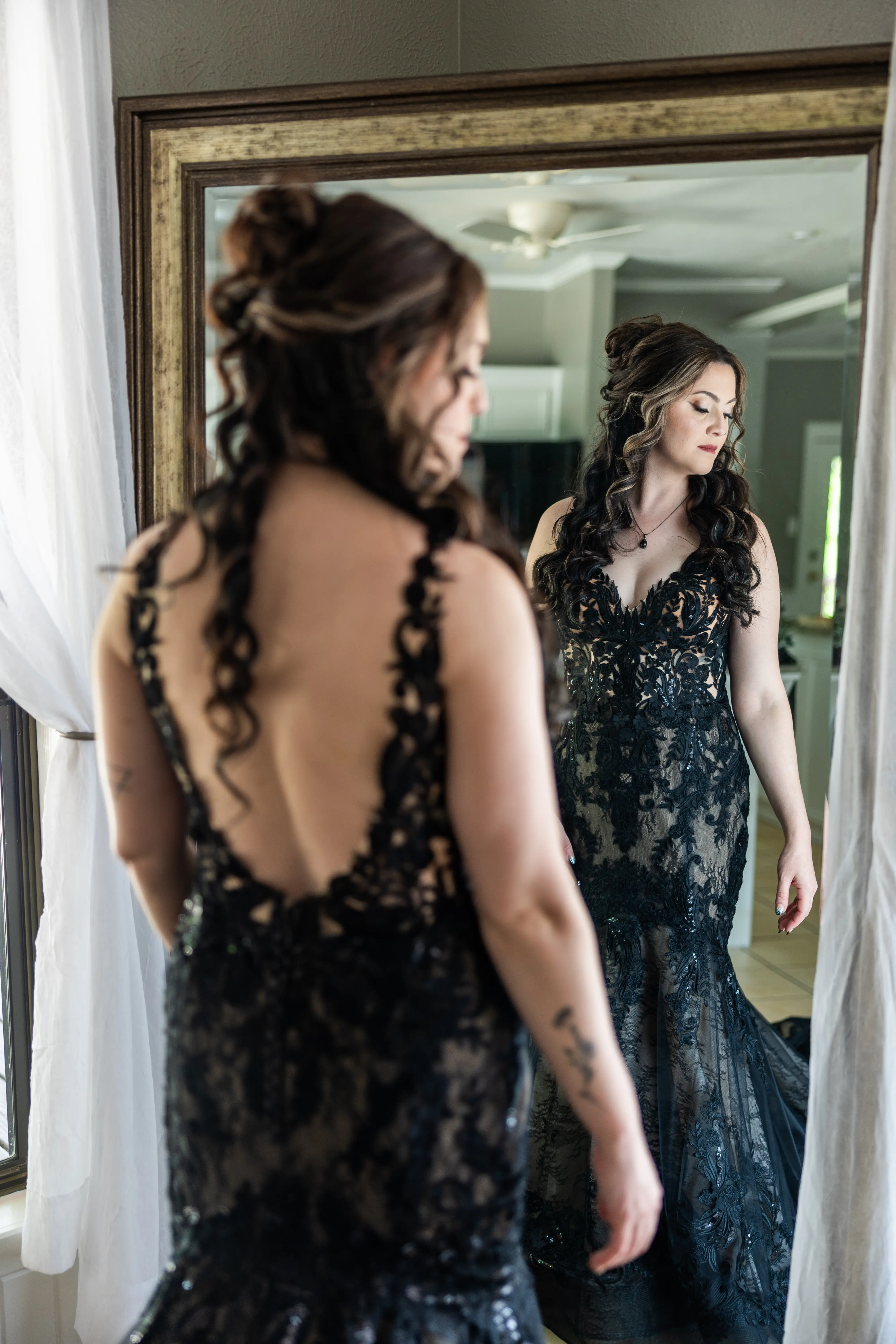 Bride wearing Zander Lane by Sottero and Midgley in the mirror