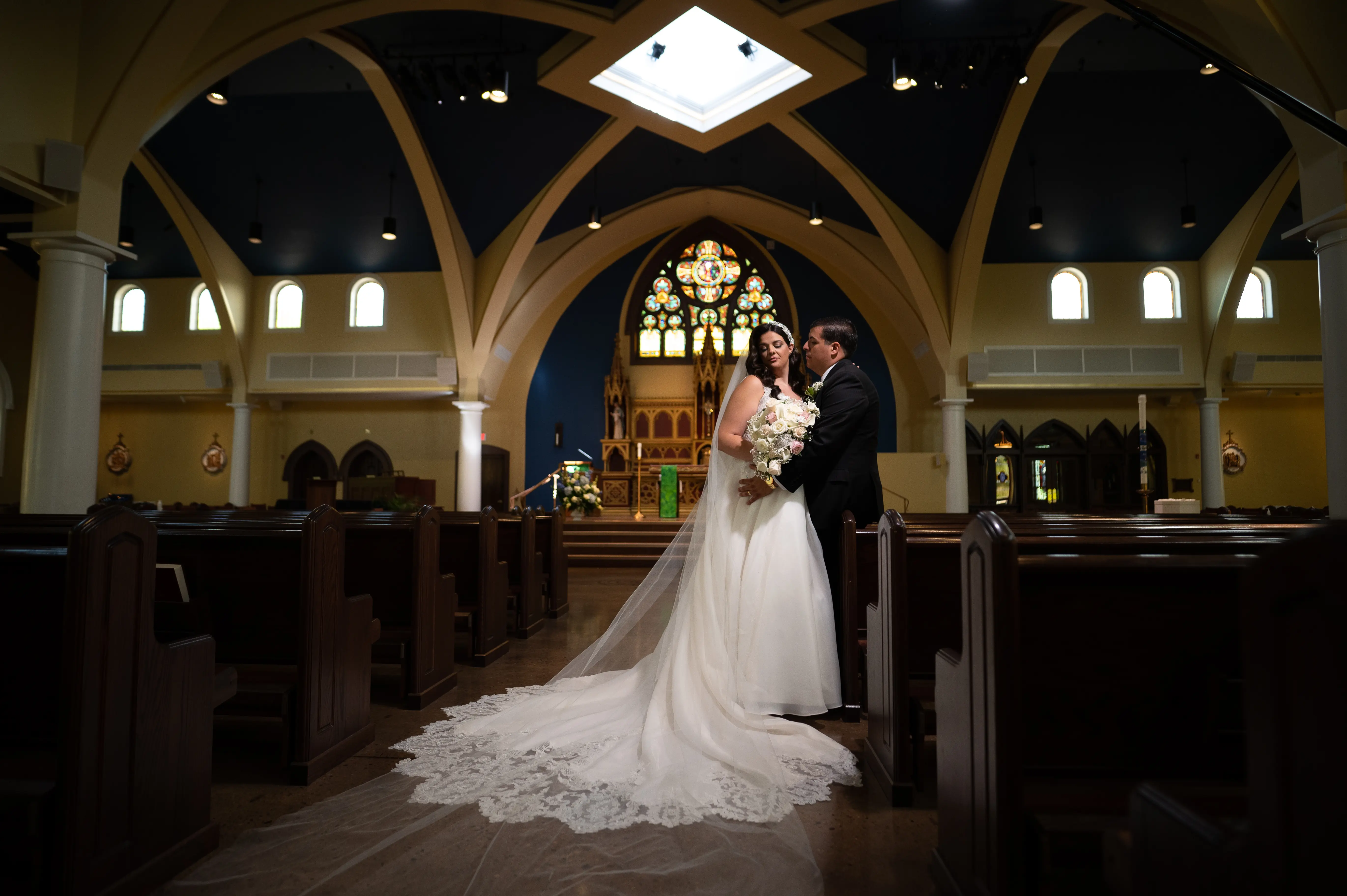 Bride In A-line Wedding Dress Named Savannah By Maggie Sottero Bride and Groom In Church
