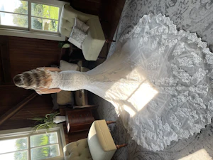 Bride Wearing Sparkly Lace Fit-And-Flare Fiona By Maggie Sottero