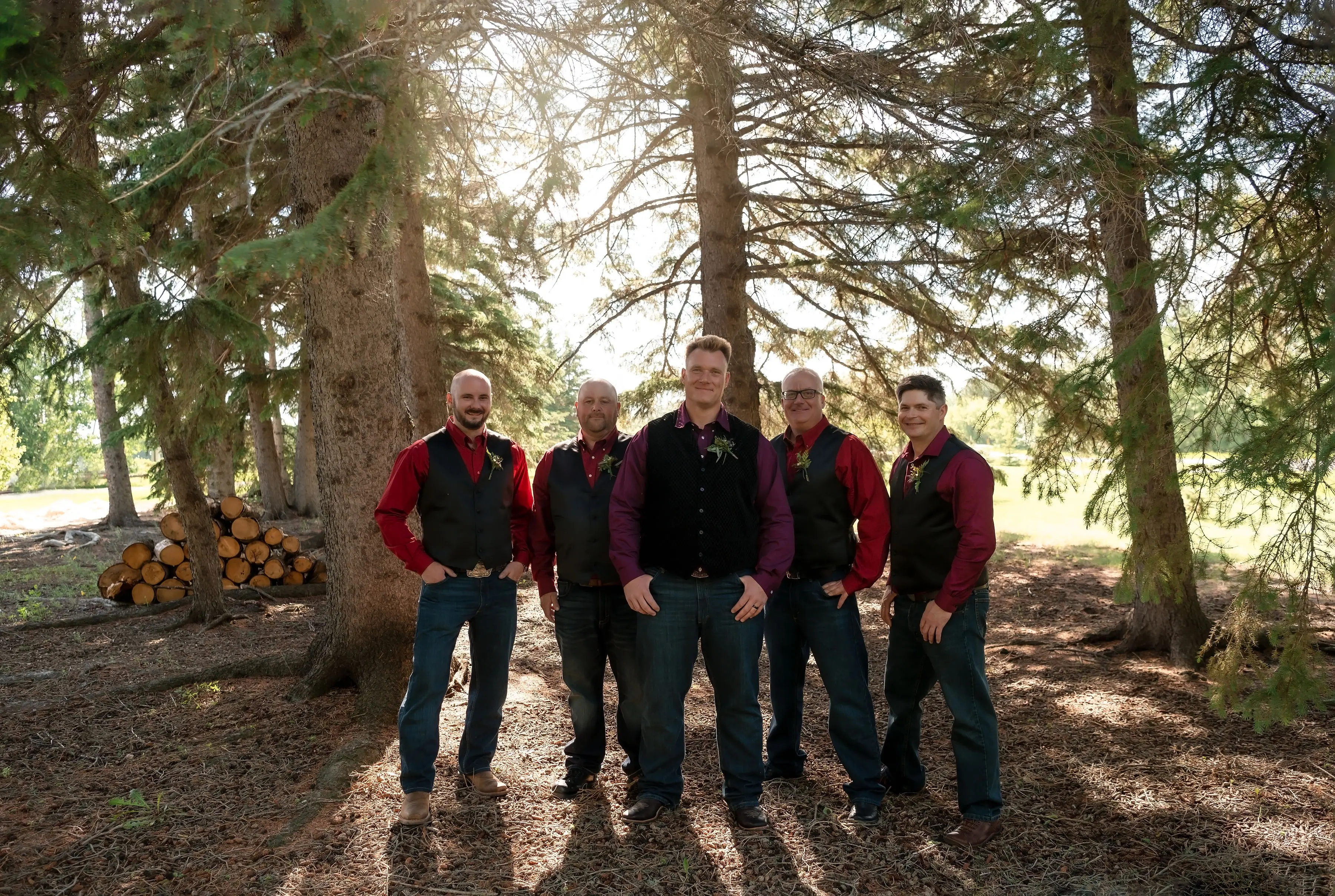 Groom And Groomsmen By Pine Trees