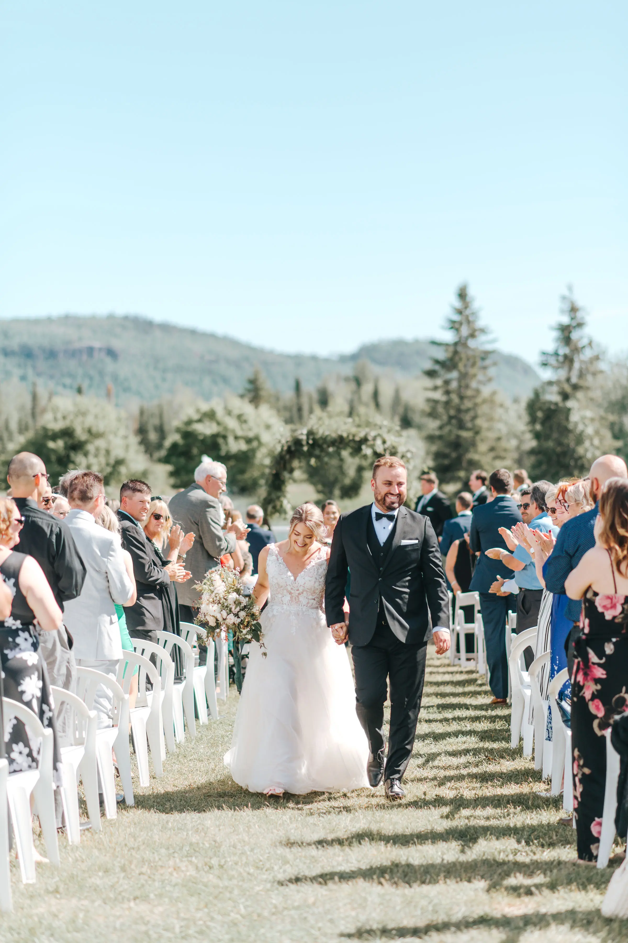 Groom With Bride Wearing V-Neck A-Line Wedding Dress Minerva By Rebecca Ingram