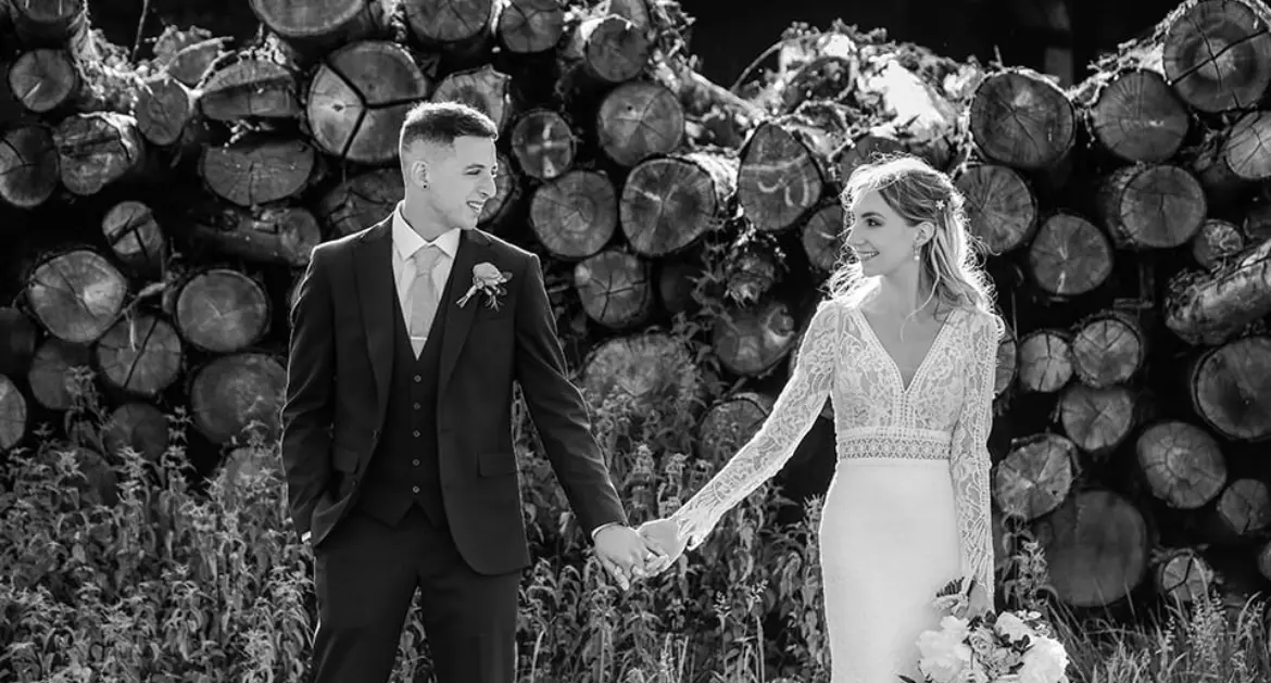 Real Bride in Allover Lace V-back Wedding Dress Named Drita by Maggie Sottero with Groom