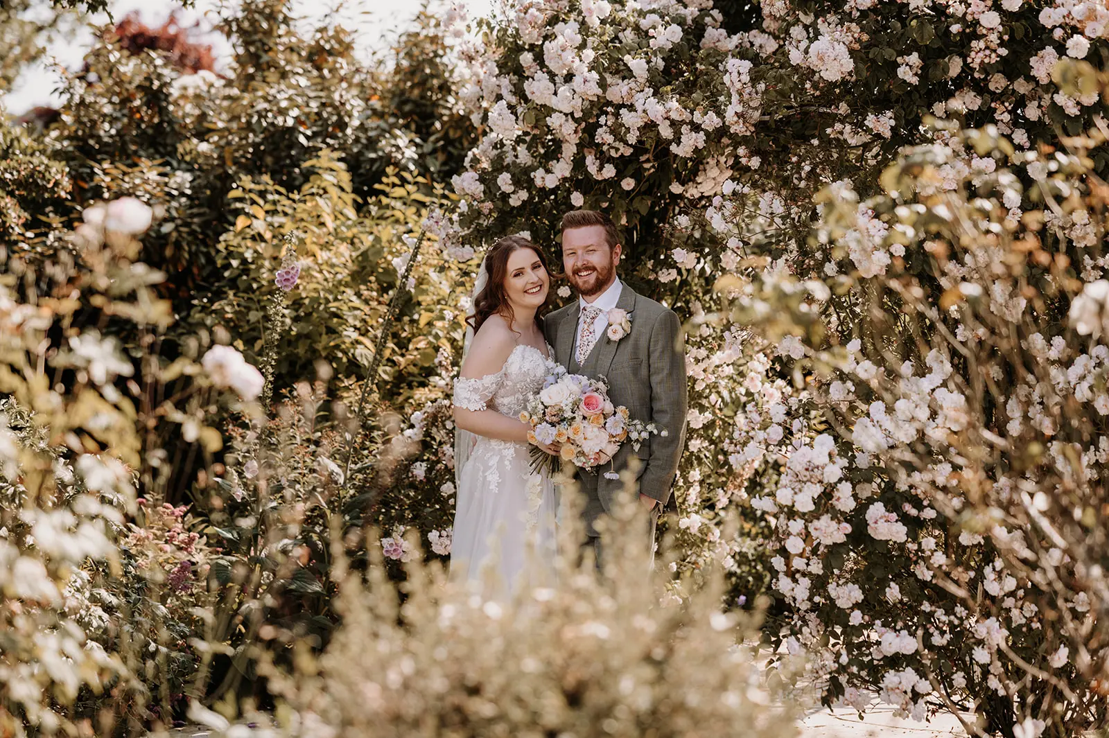 Groom With Bride Wearing Cold Shoulder Princess Wedding Dress Stevie By Maggie Sottero