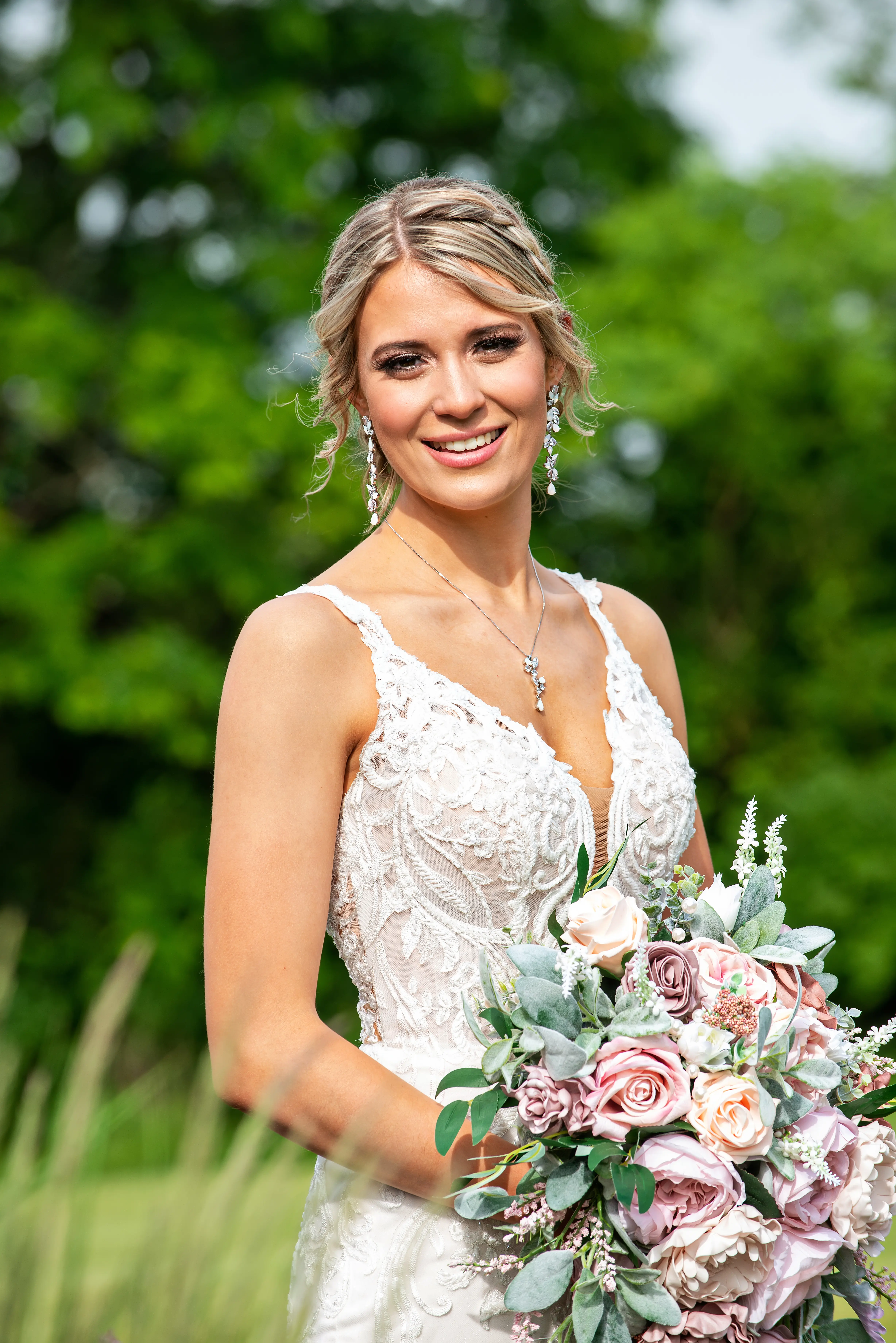 Bride in Elegant Lace Sheath Wedding Dress with Beaded Lace Motifs over Textured Tulle Called Hamilton by Sottero & Midgley