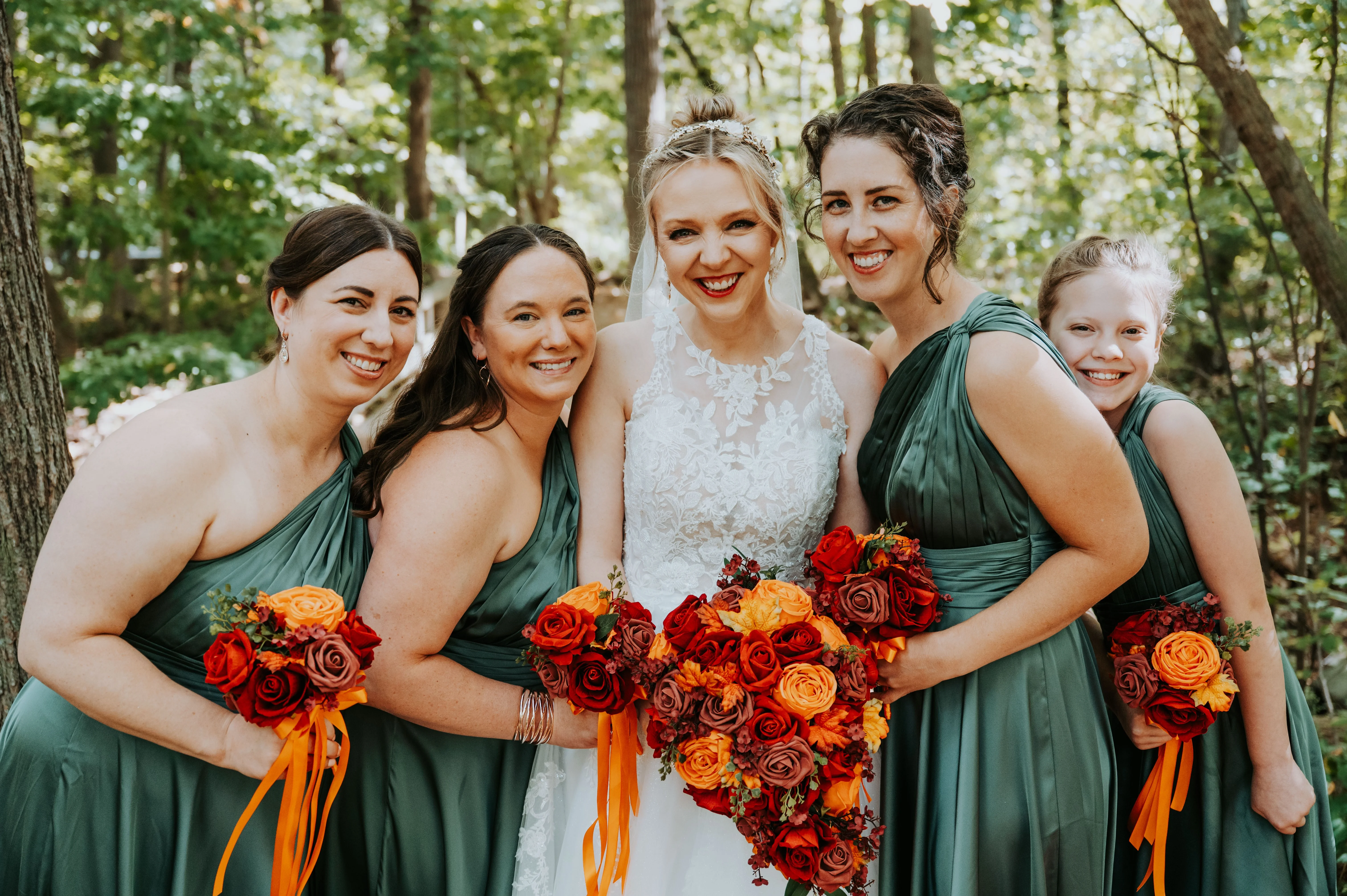 Bride wearing Lace Aline Wedding Dress Called Rickie By Rebecca Ingram With Her Bridesmaids