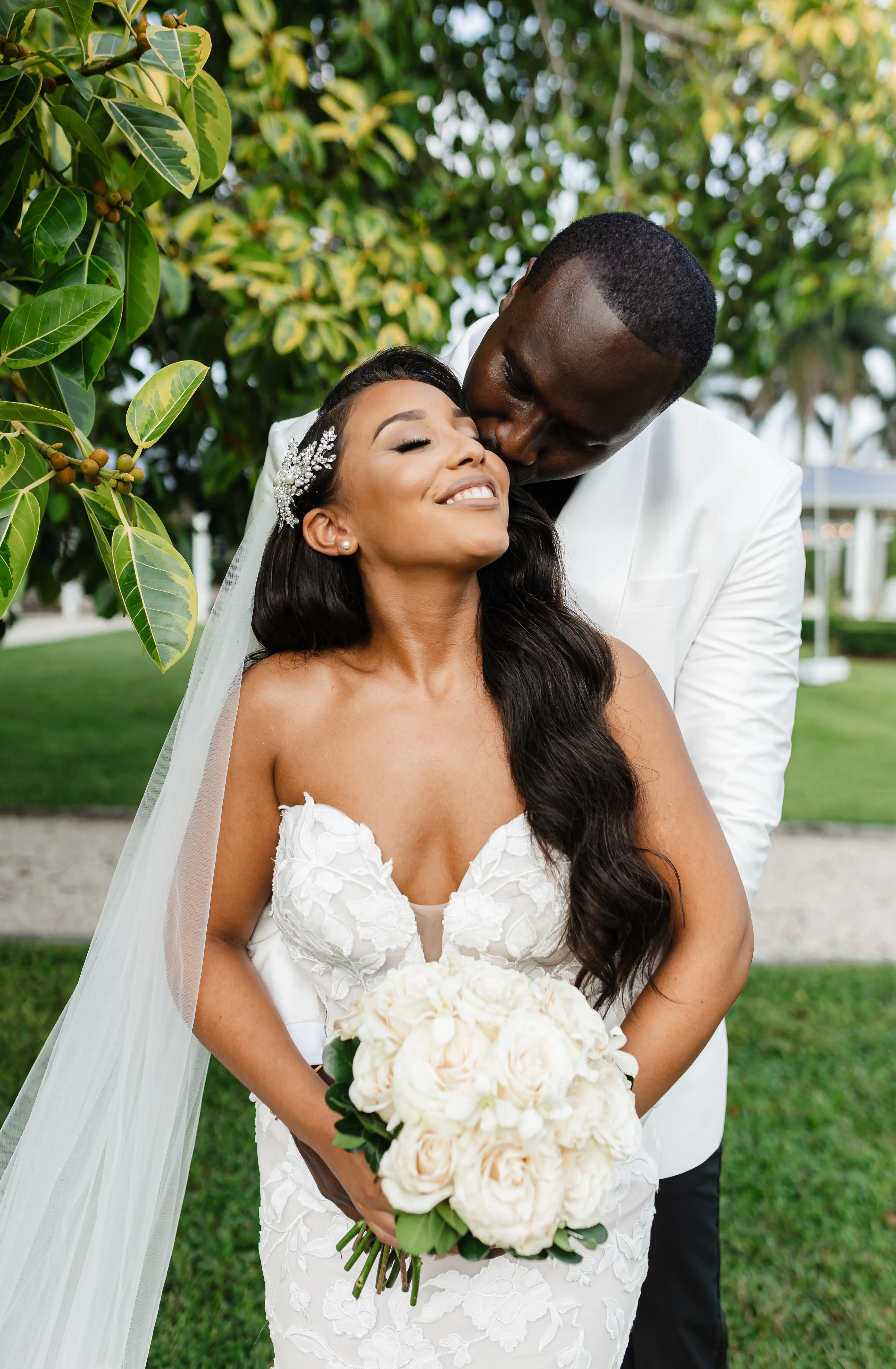 Real Bride in Strapless Mermaid Bridal Gown in Oversized Lace with Floral Lace Motifs over Sparkle Tulle and Sweetheart Neckline called Hattie by Rebecca Ingram