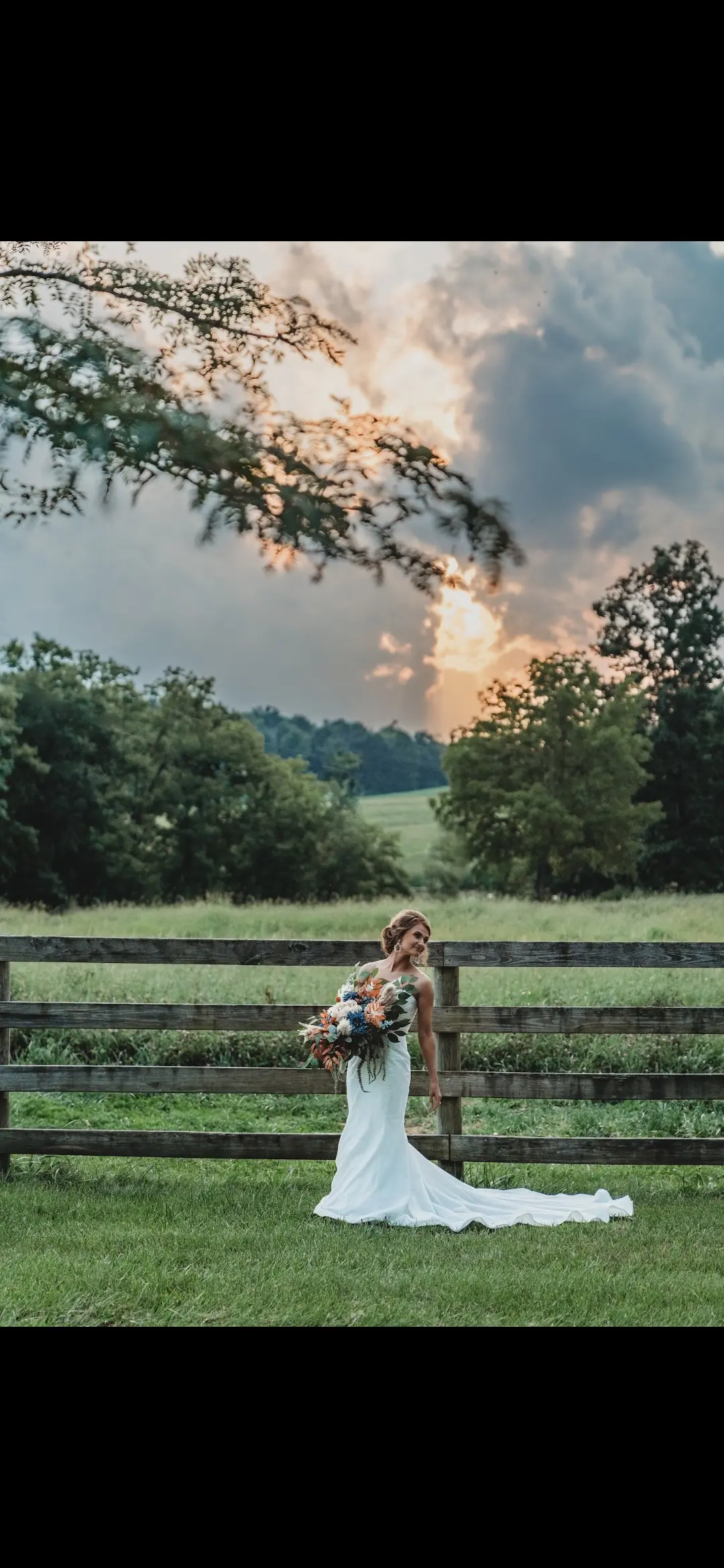 Bride Wearing Sparkly Fit-and-flare Wedding Dress Called Anniston Lane By Maggie Sottero In A Field