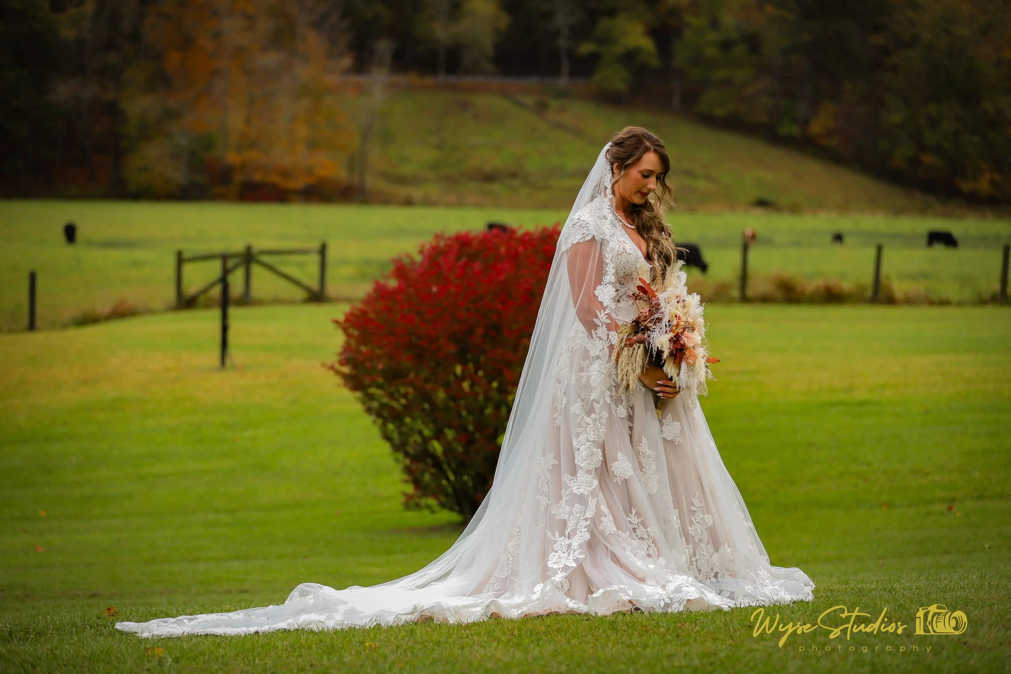 Bride wearing Kingsley wedding gown by Sottero and Midgley