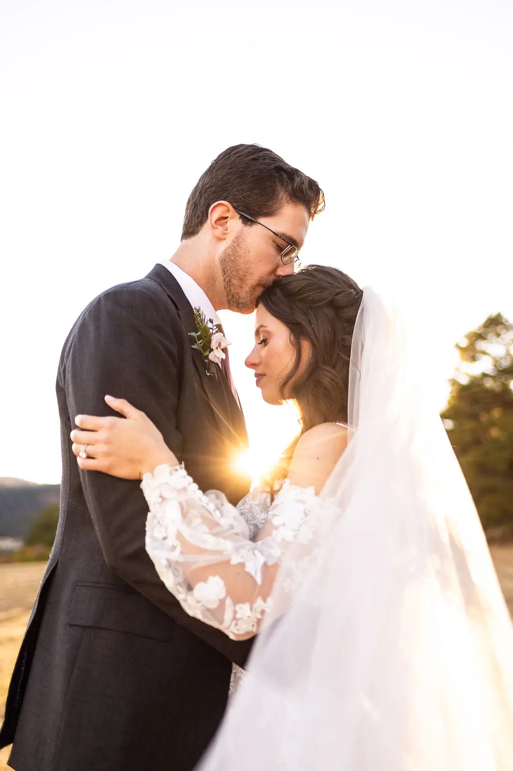 Bride with groom wearing boho A-line wedding dress
