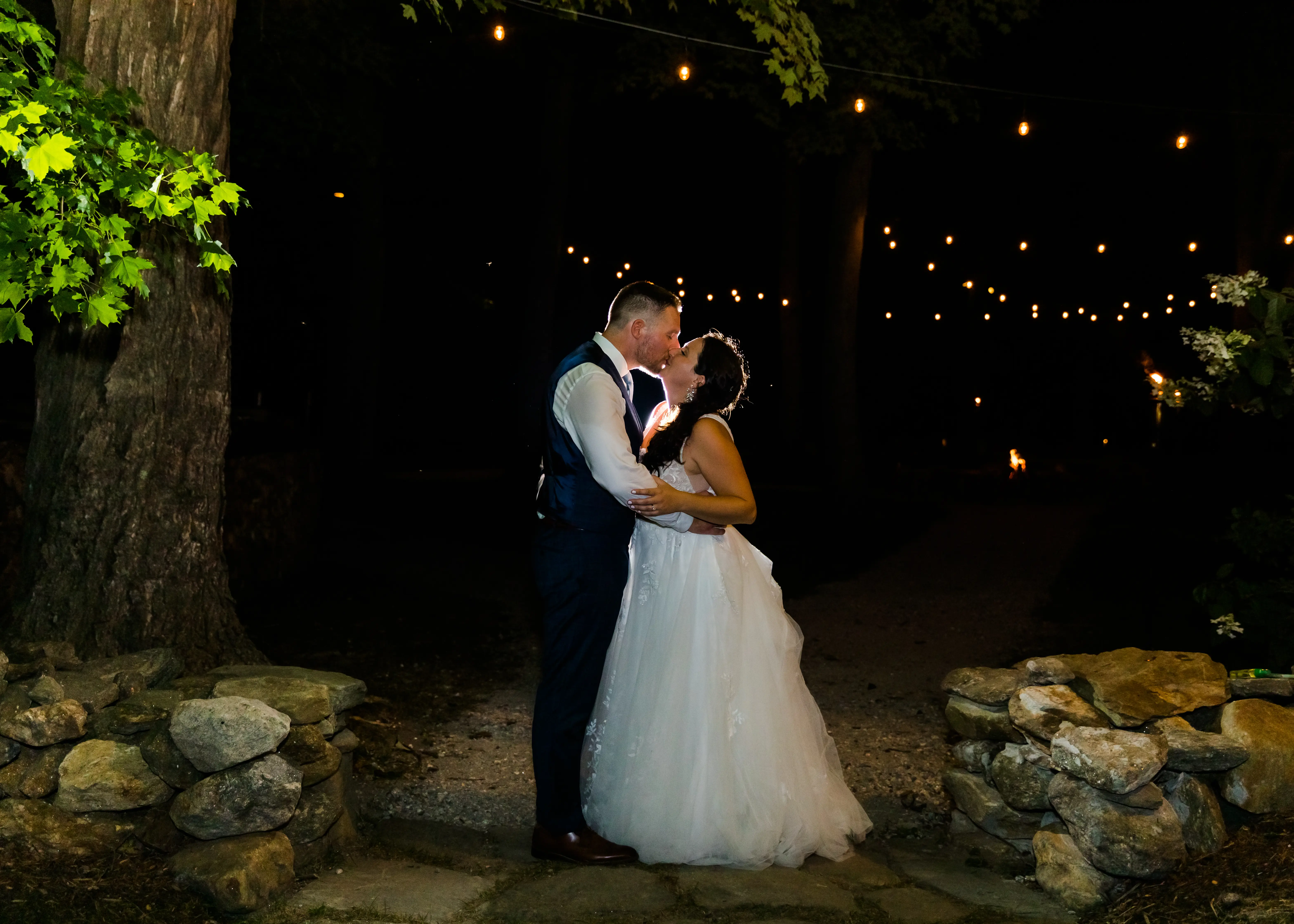 Groom With Bride Wearing Lace A-Line Wedding Dress Raelynn By Rebecca Ingram