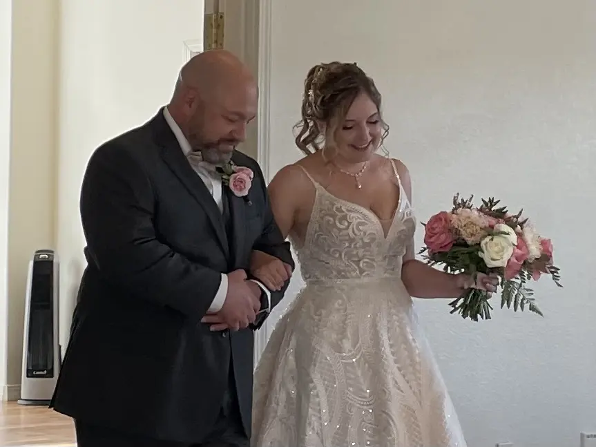 Groom With Bride Wearing Boho Princess A-Line Wedding Dress Roxanne By Sottero And Midgley