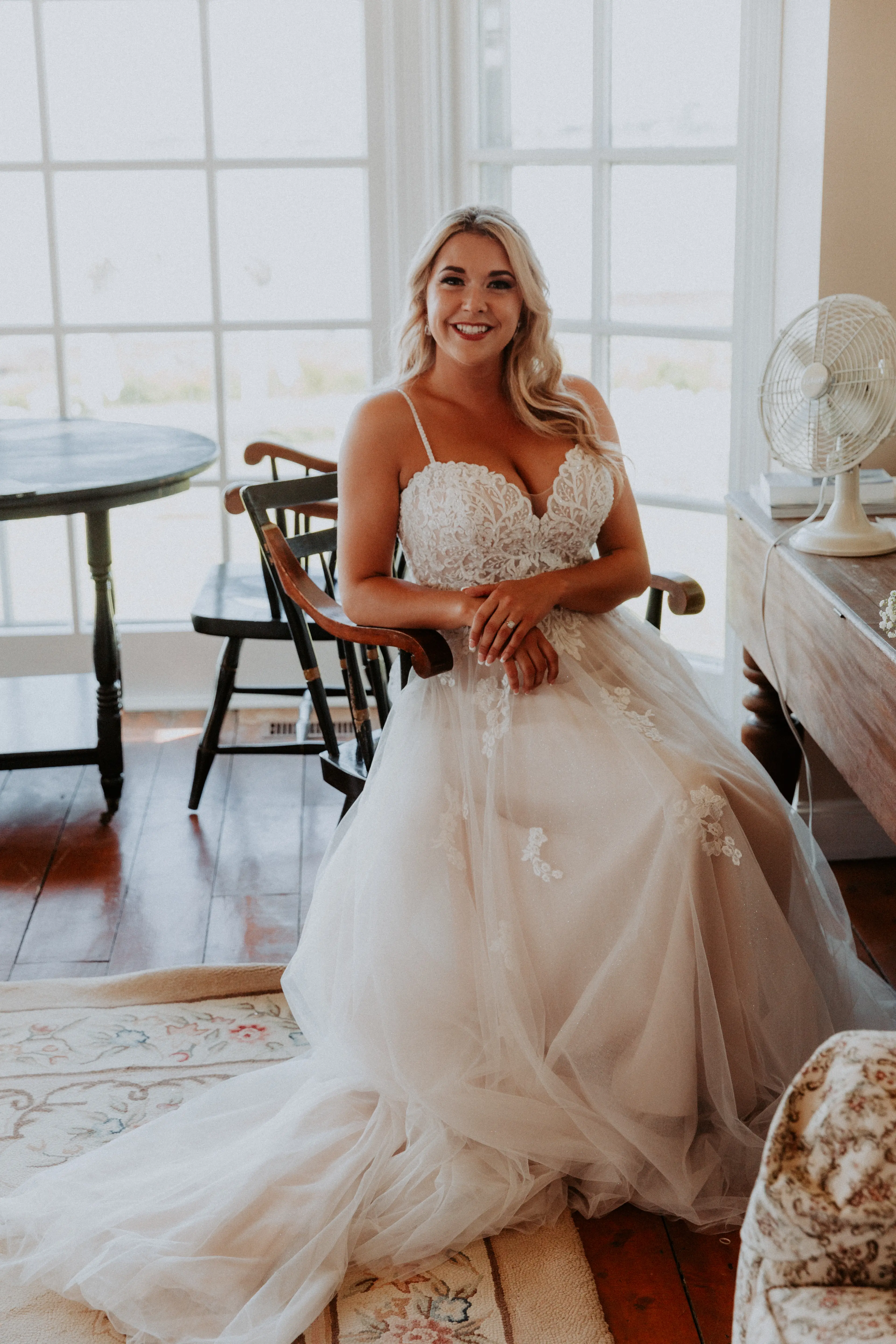 Bride in Flattering A-Line Spaghetti Strap Wedding Dress with Romantic Lace Called Marisol by Rebecca Ingram