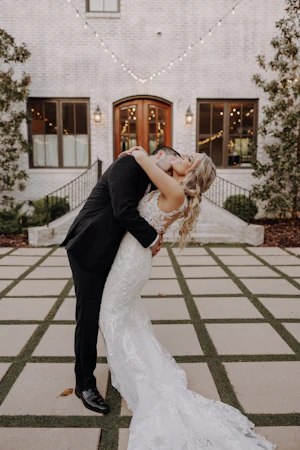 Bride In Lace Sheath Gown Hamilton By Sottero Midgley With Groom