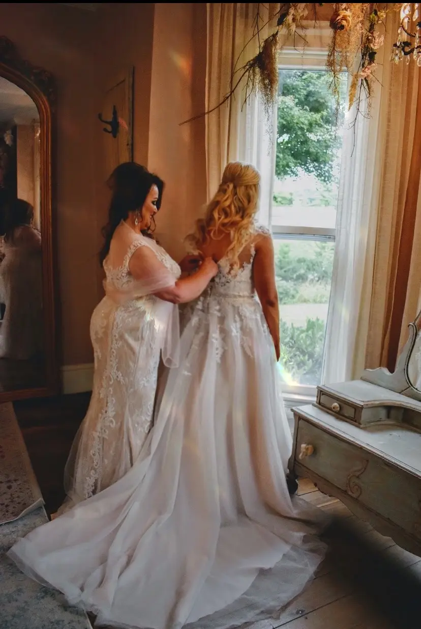 Mother of the Bride and Bride Getting Ready Wearing Lace Ballgown Wedding Dress Called Olivia by Rebecca Ingram