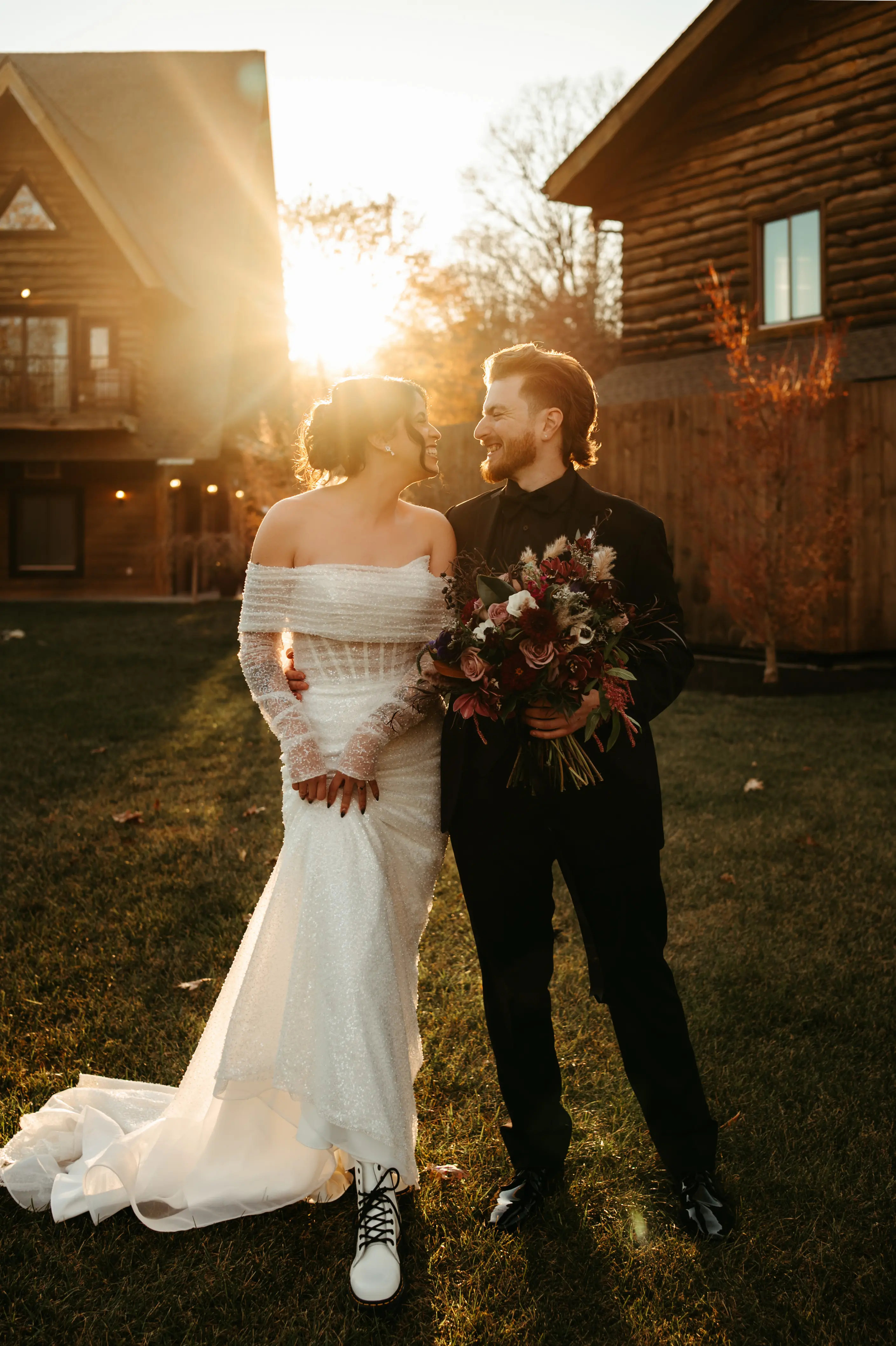 Bride Wearing Pearl Sparkly Wedding Dress Called Drew By Maggie Sottero And Groom Looking At Each Other