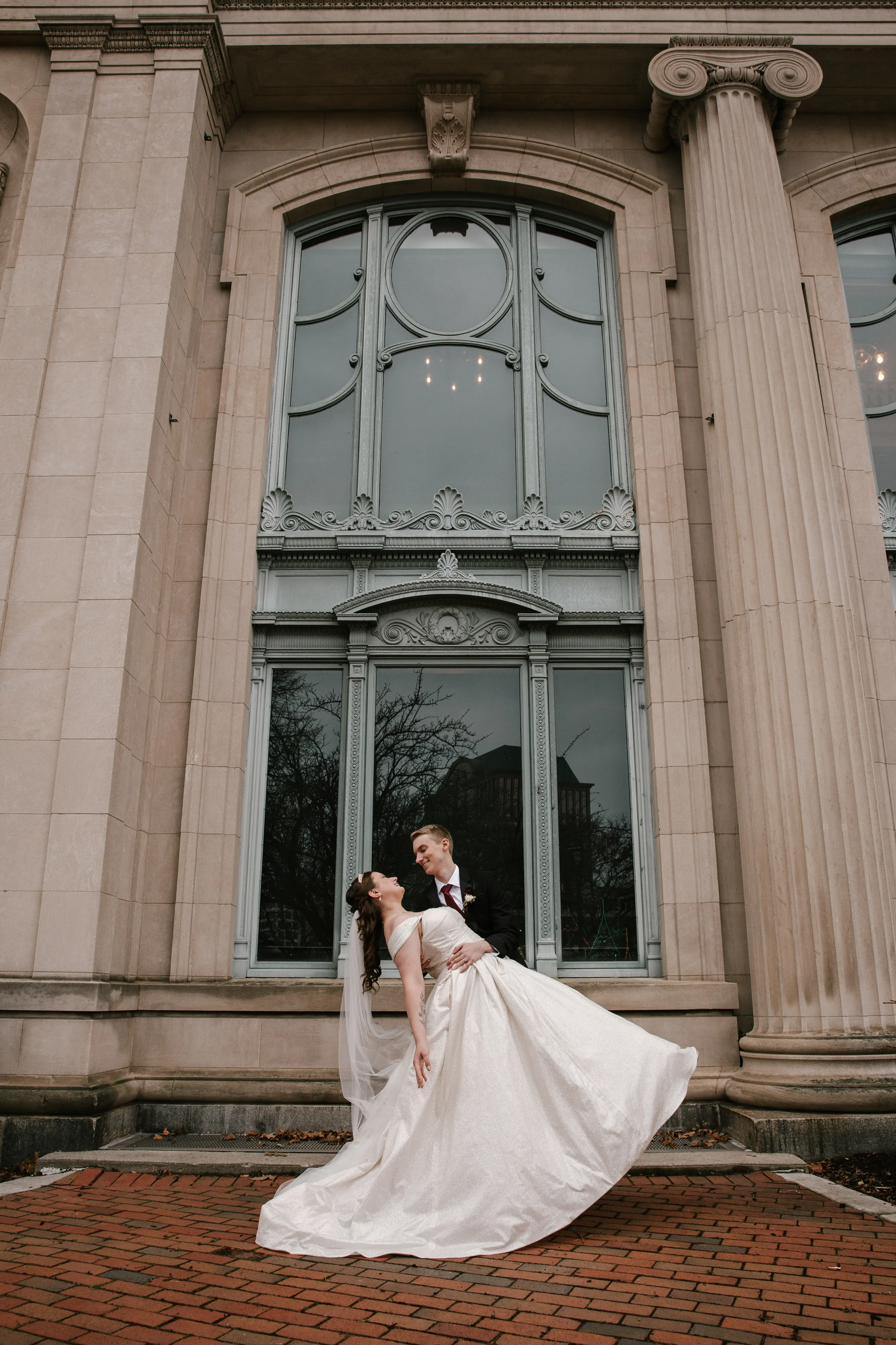 Groom Dipping Bride in Ball Gown Wedding Dress With Sparkles Named Anniston By Maggie Sottero