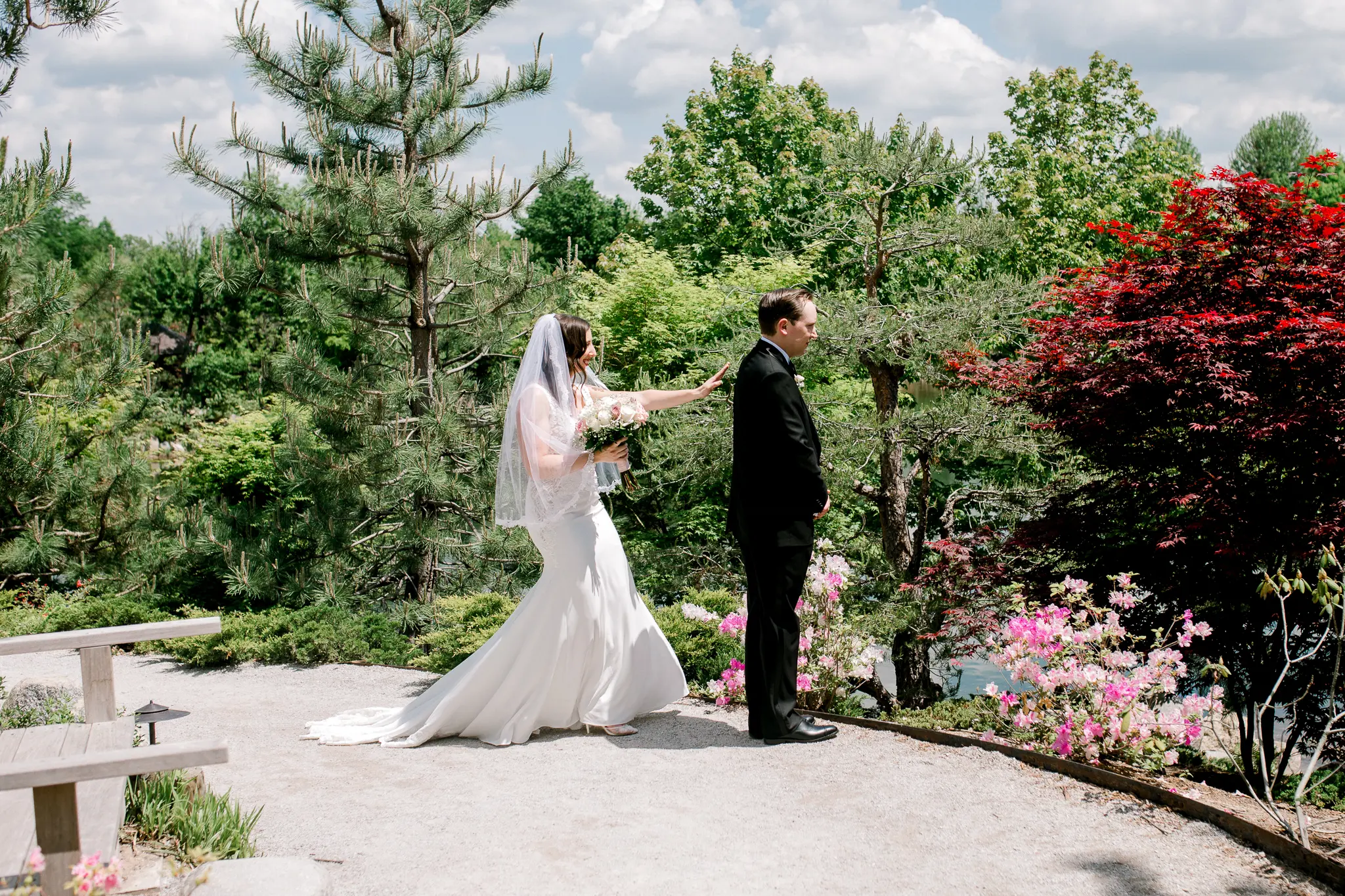 bride with groom in sexy sheath wedding dress