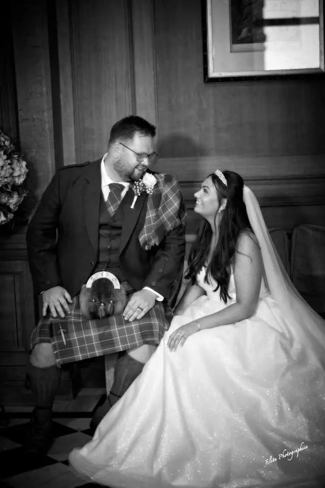 Bride wearing Anniston by Maggie Sottero with her husband