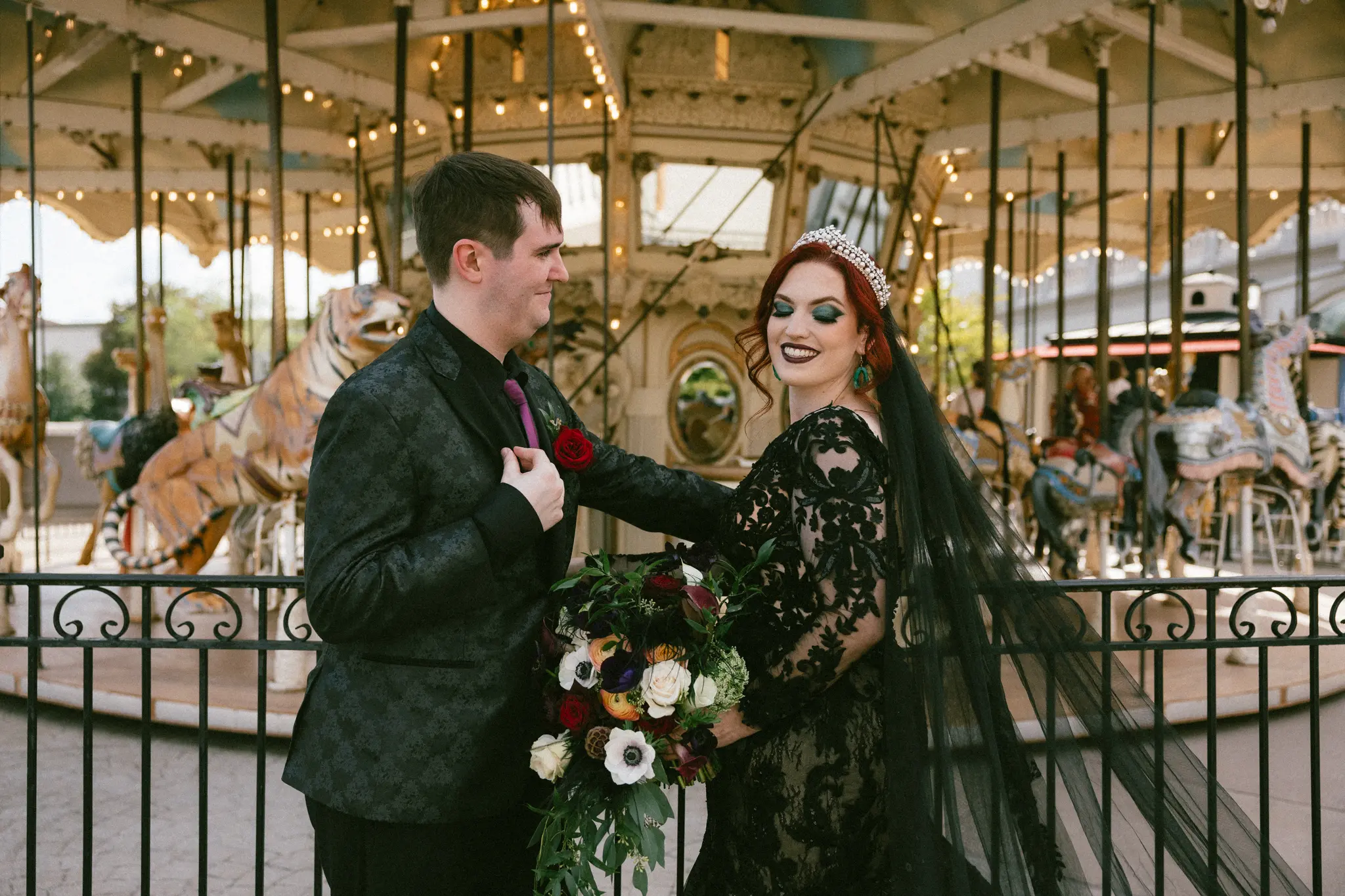 Bride Wearing Black Lace Wedding Dress Called Zander Lane By Sottero And Midgley With Groom Looking At Her