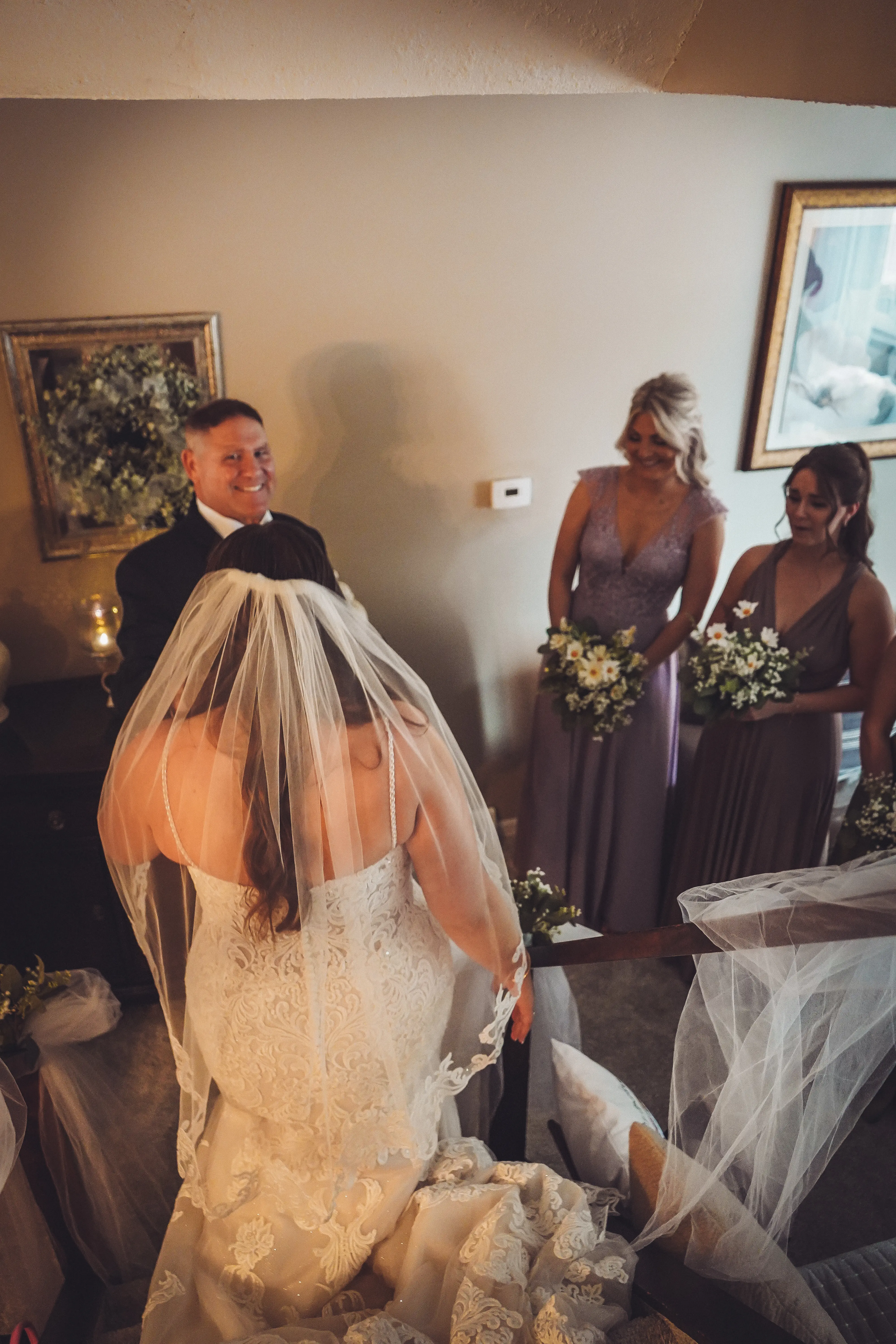 Bride wearing Fiona by Maggie Sottero talking to her bridal party
