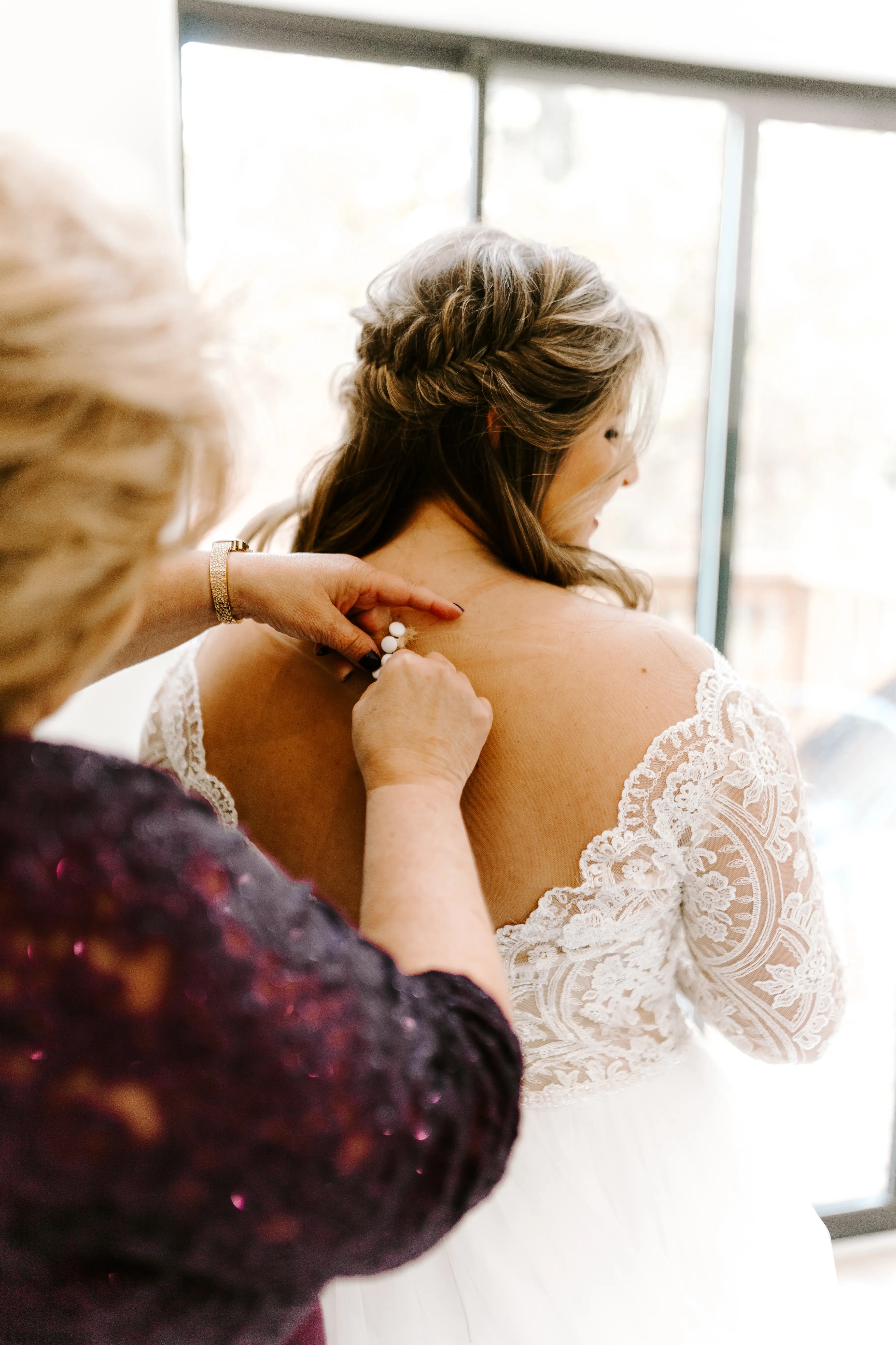 Bride Wearing Princess Wedding Dress Called Mallory Dawn By Maggie Sottero Getting Buttoned Up