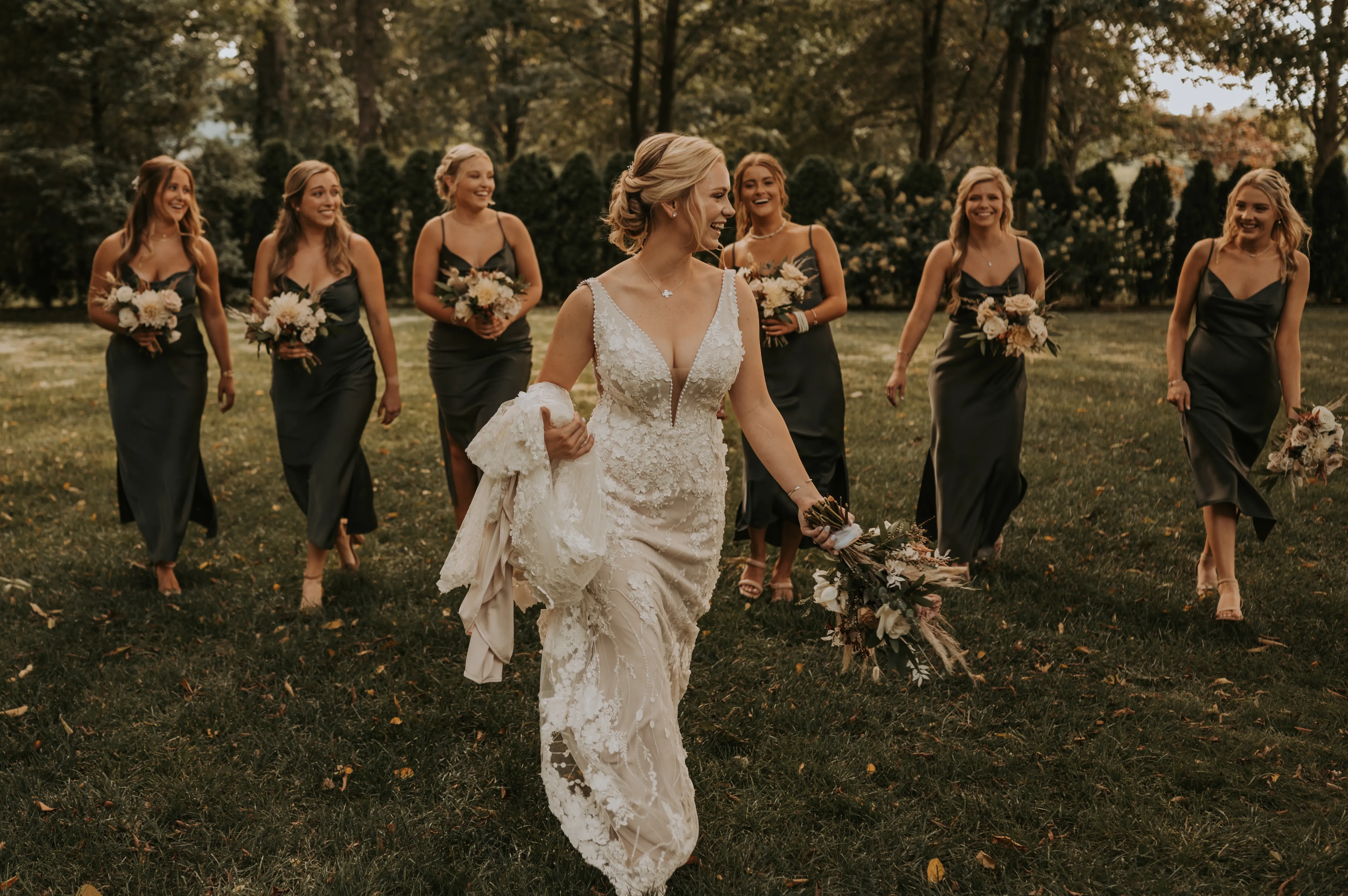 Bridal Party with Bride in Mermaid Wedding Dress with 3-D Floral Motifs and Extended Scalloped Lace Train Called Cruz by Sottero & Midgley