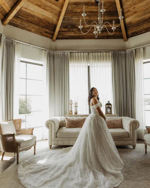 Bride Wearing Sparkly Ballgown Wedding Dress Called Zartasha By Sottero and Midgley