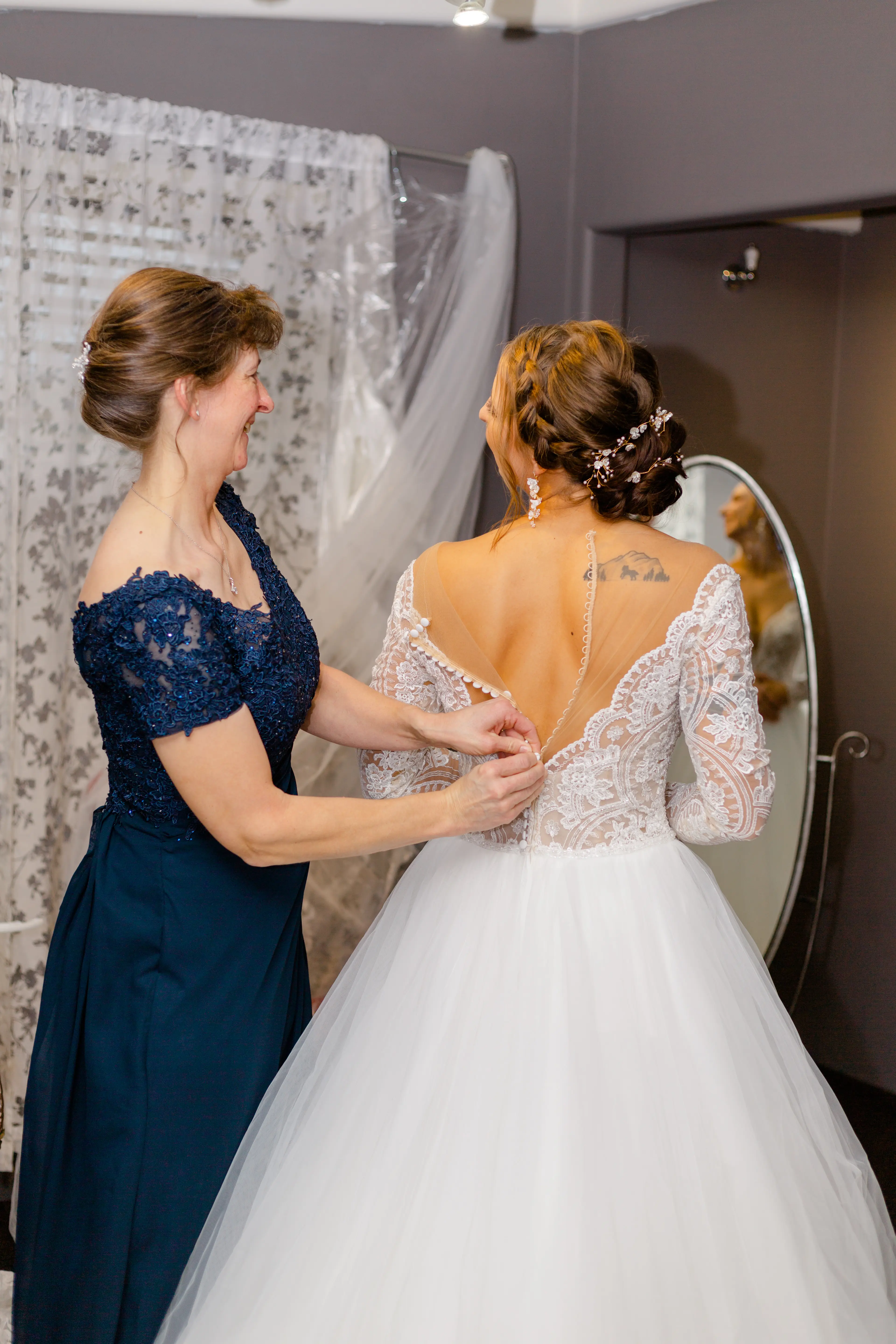 Bride Gets Ready for Wedding Day in Romantic Long Sleeve Ball Gown Wedding Dress with Lace Motifs on Nude Bodice and Tulle Skirt Called Mallory Dawn by Maggie Sottero