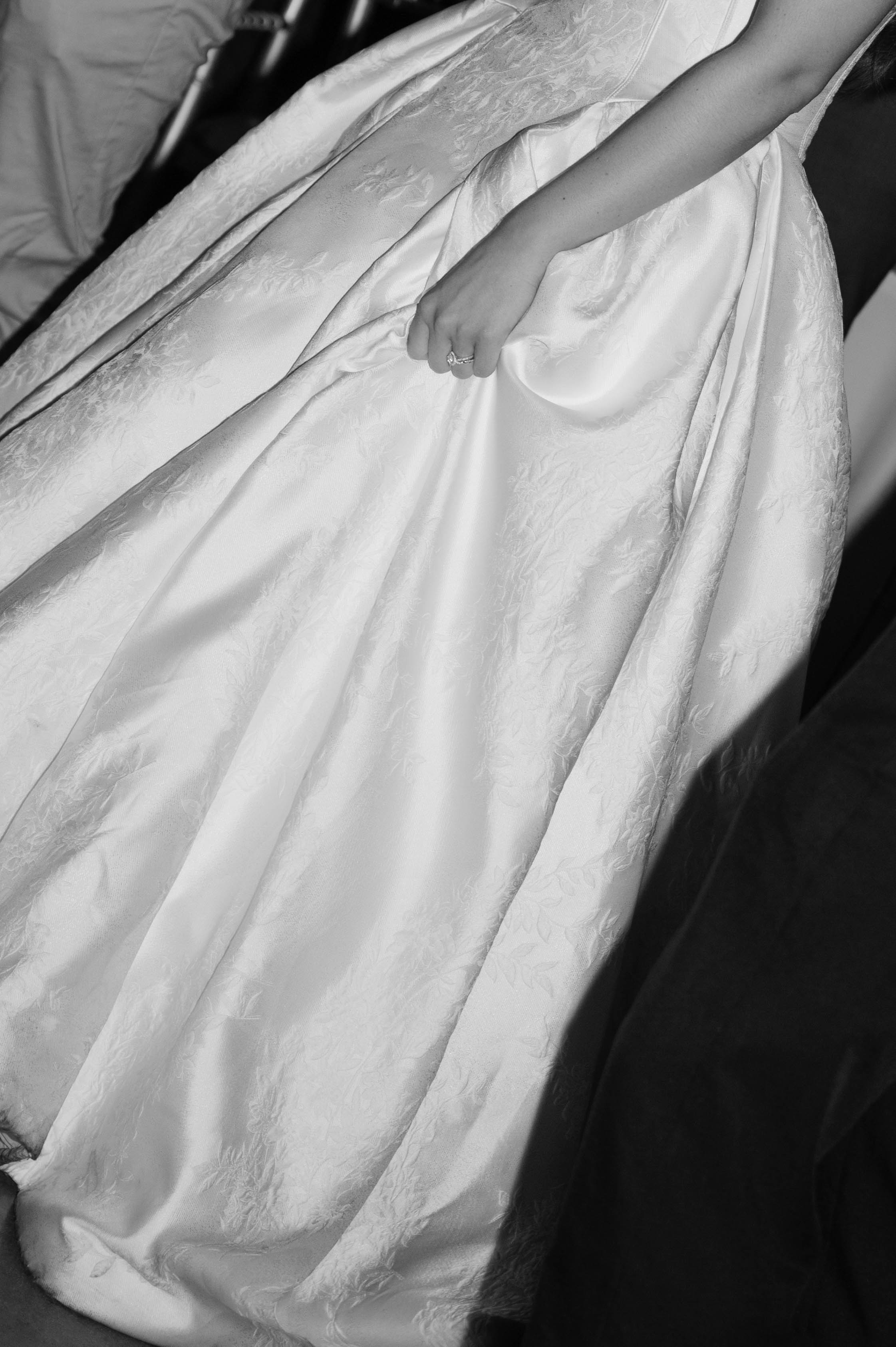 Close-up image of skirt of Bride Wearing Jacquard Ballgown Wedding Dress Called Fortune Marie By Maggie Sottero